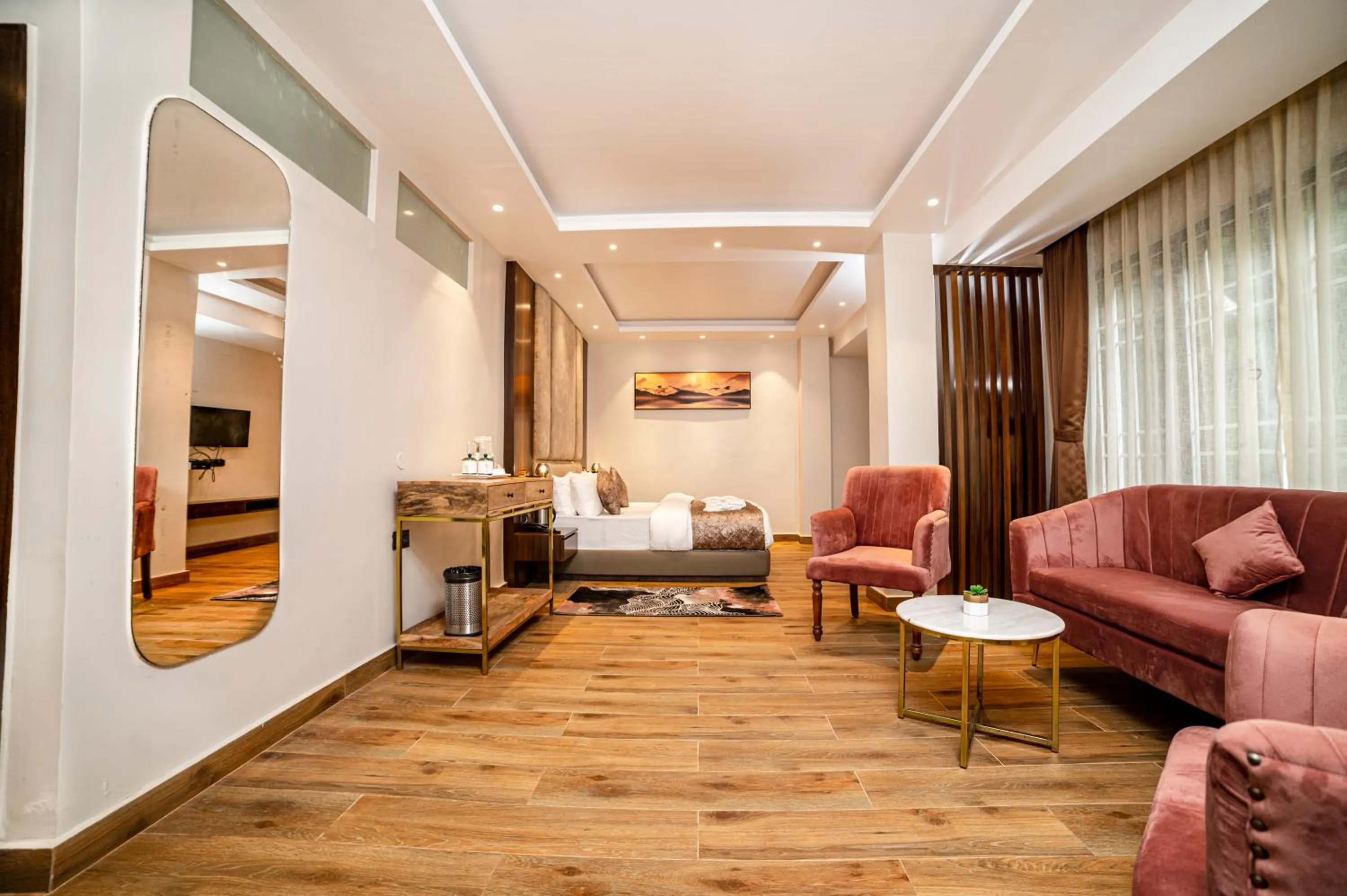 Bedroom, Seating Area in Hotel Alpha Omega