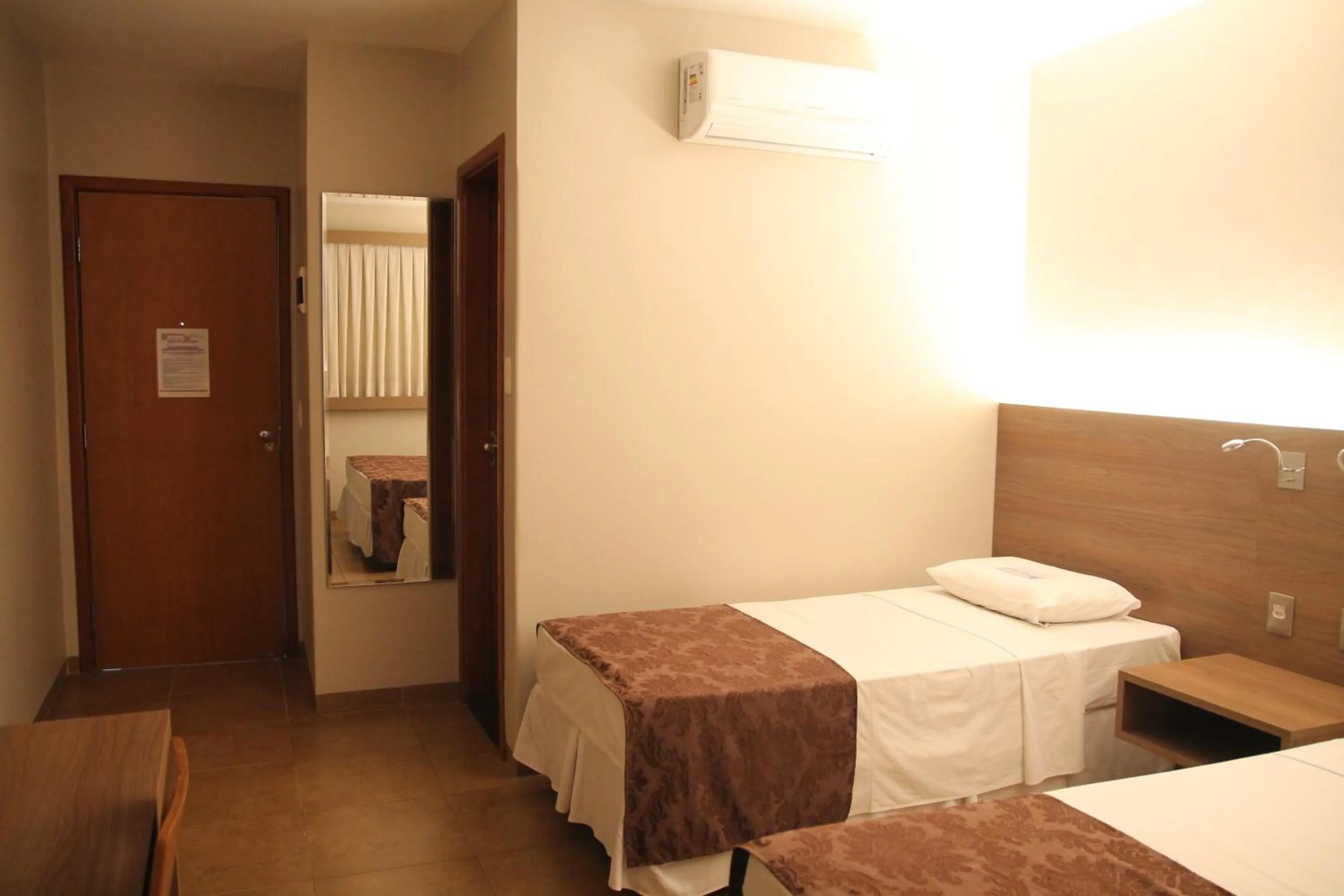 Bed in Orion Inn Hotel