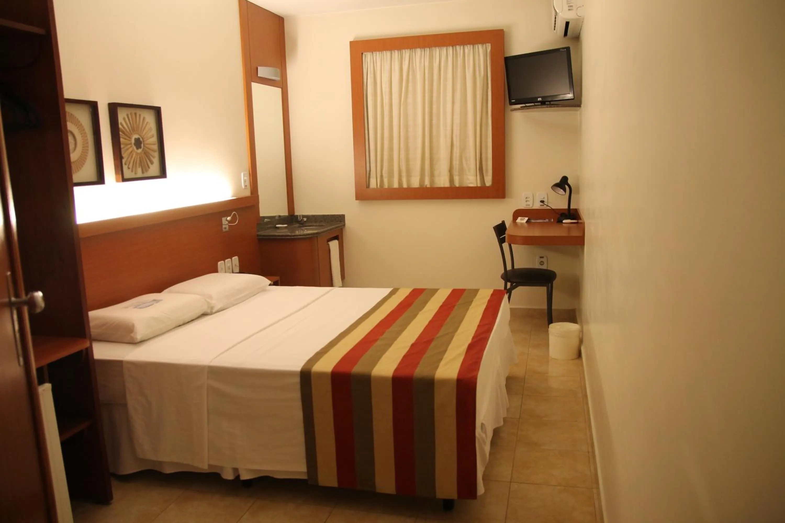 Bed in Orion Inn Hotel