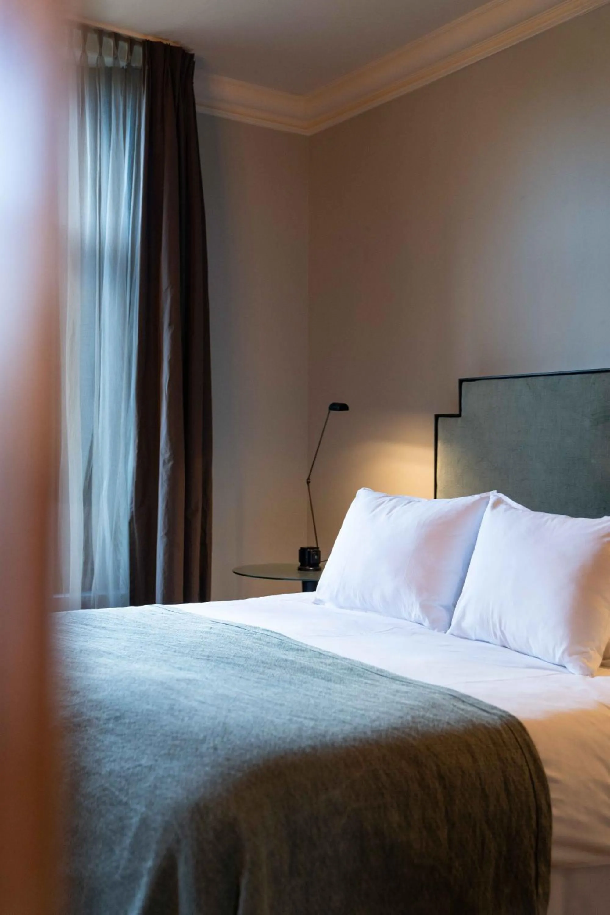 Bed in Boutique hotel Villa Trompenberg