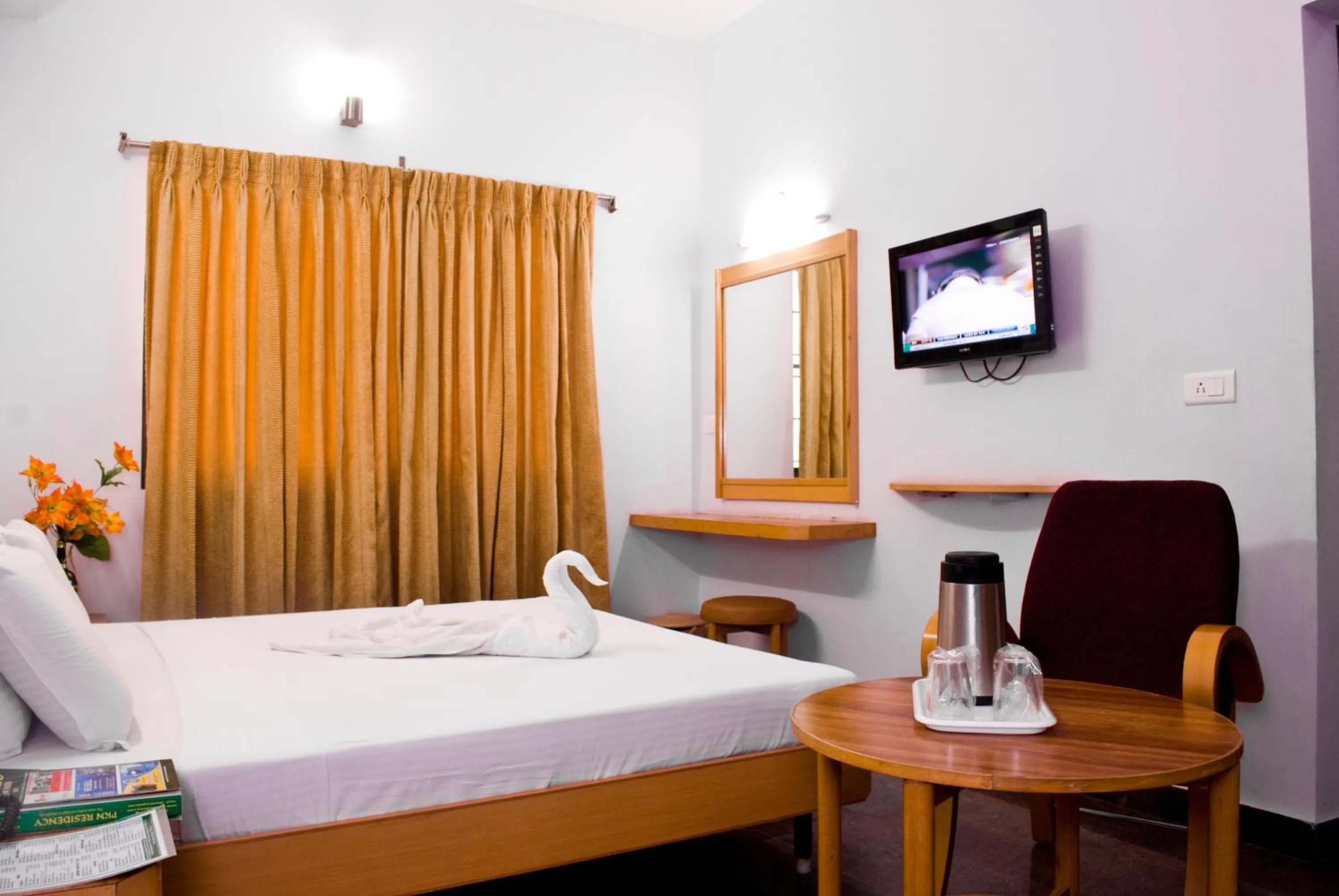 Bed in Hotel Rajadhane Madurai