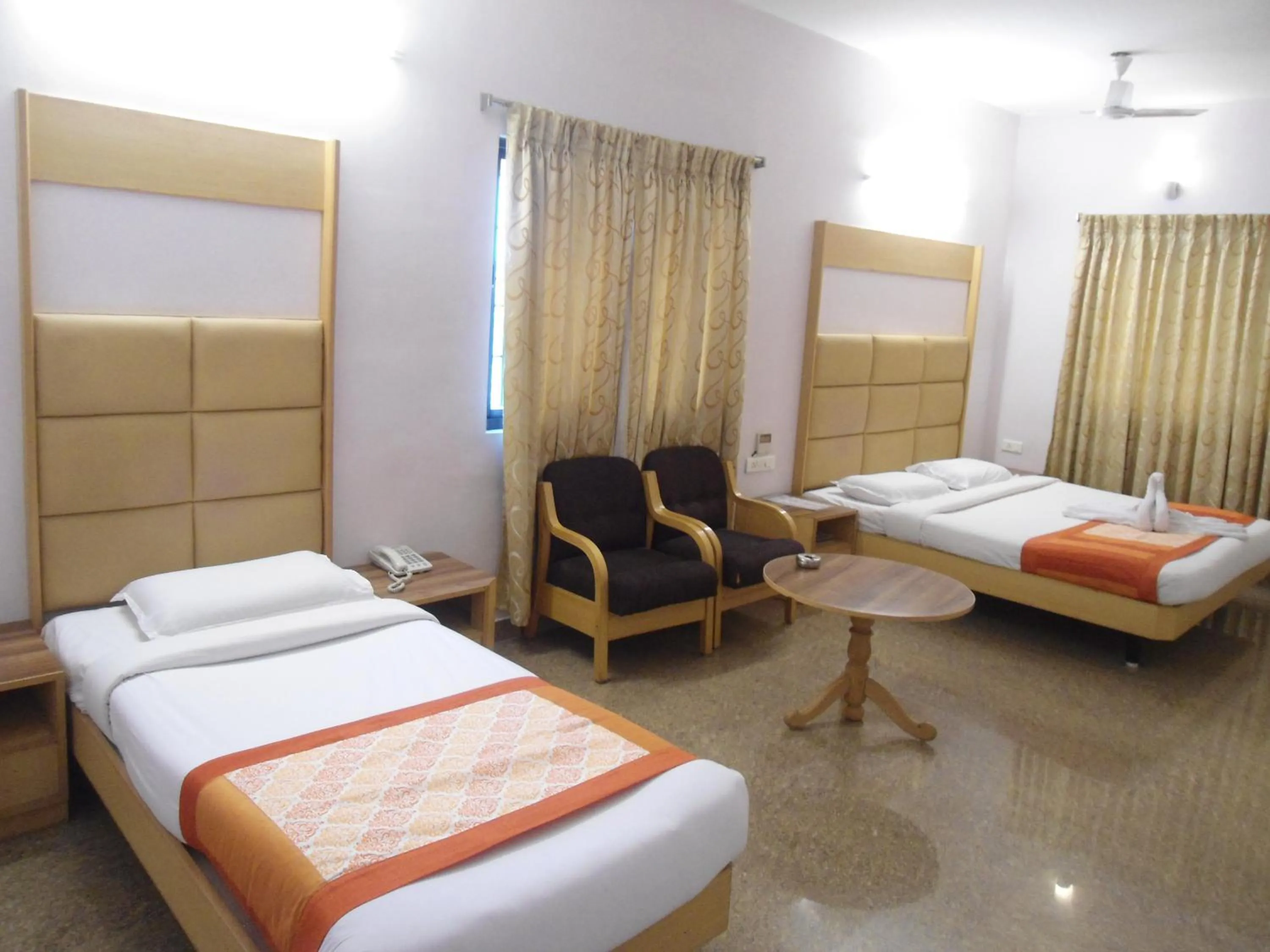Bed in Hotel Rajadhane Madurai