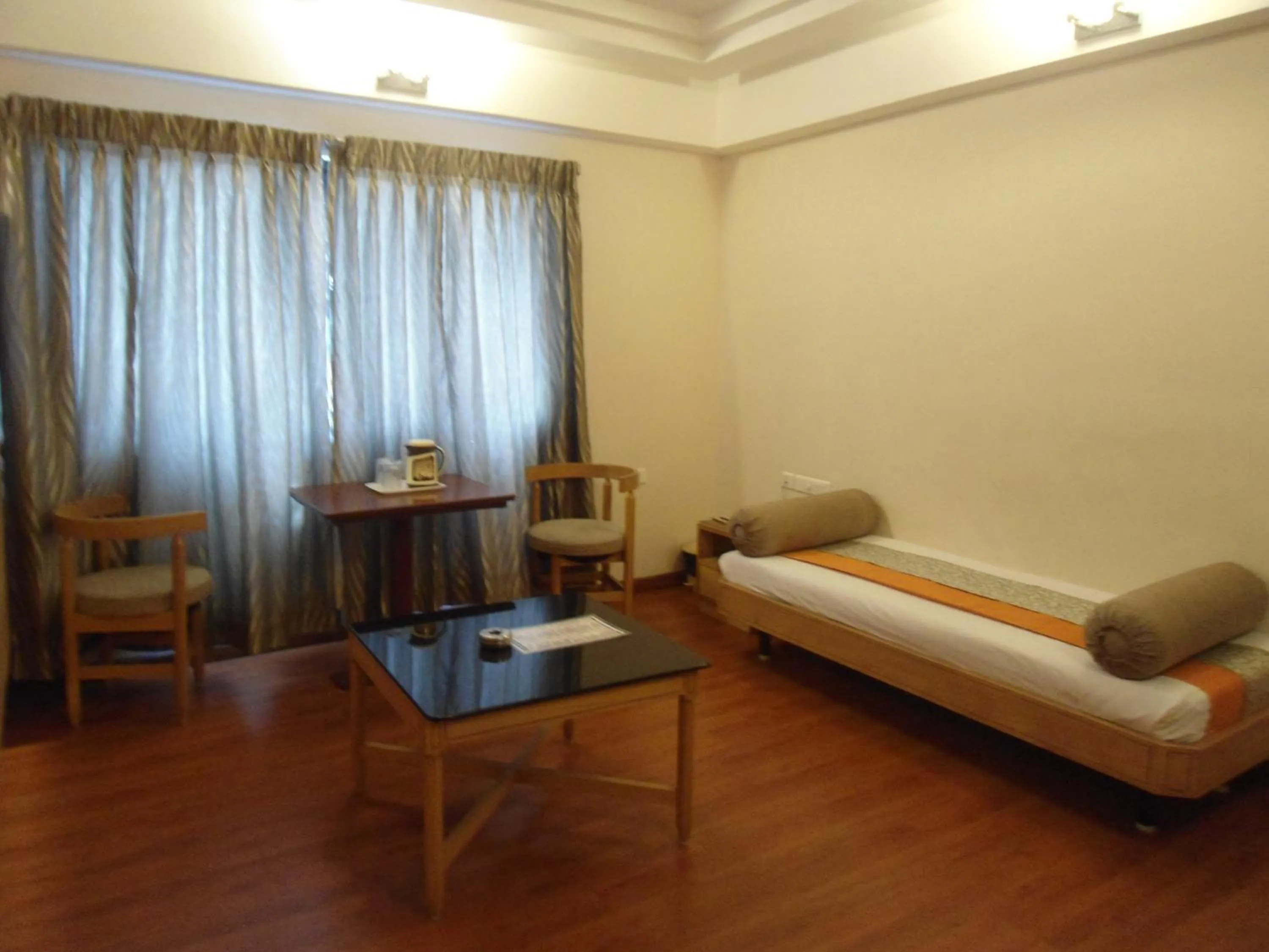 Living room, Seating Area in Hotel Rajadhane Madurai