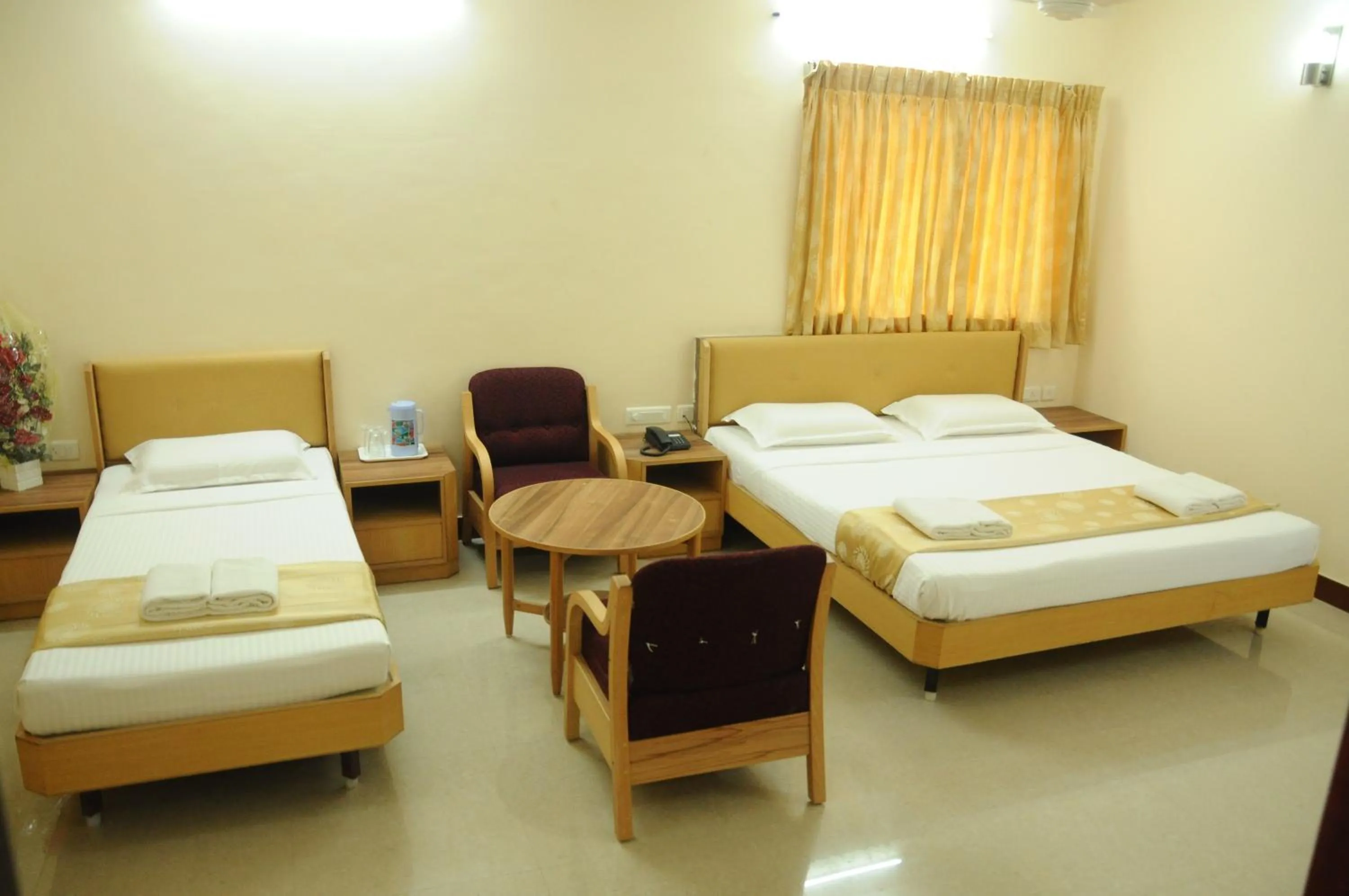 Bed in Hotel Rajadhane Madurai