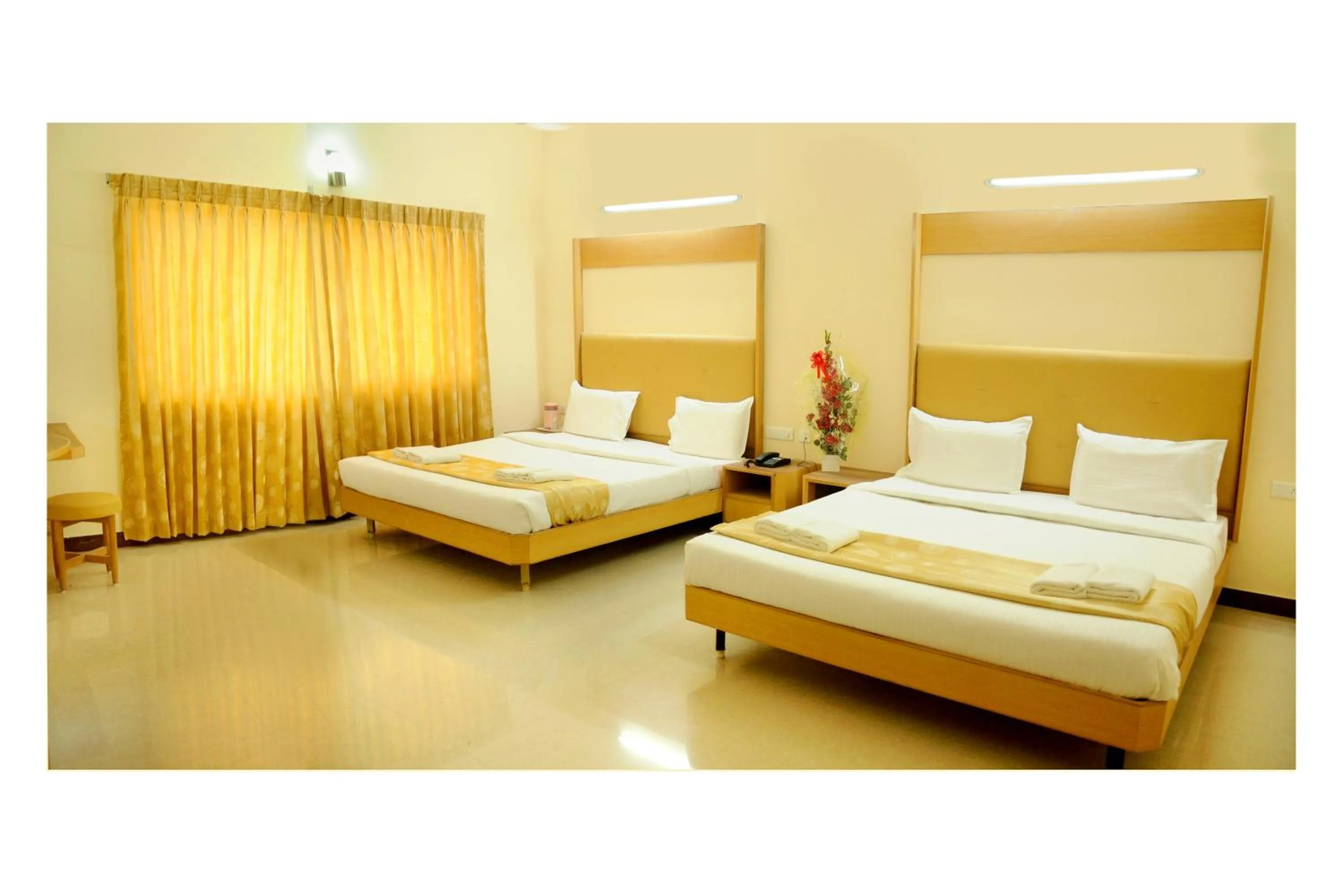 Bed in Hotel Rajadhane Madurai