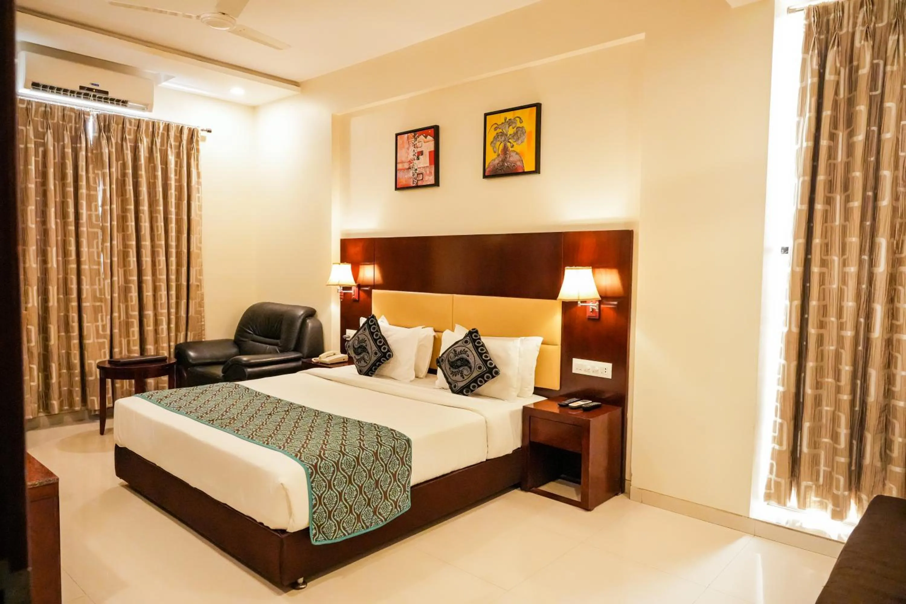 Photo of the whole room, Bed in Hotel Sai Jashan Shirdi - Where blessings & comfort meet