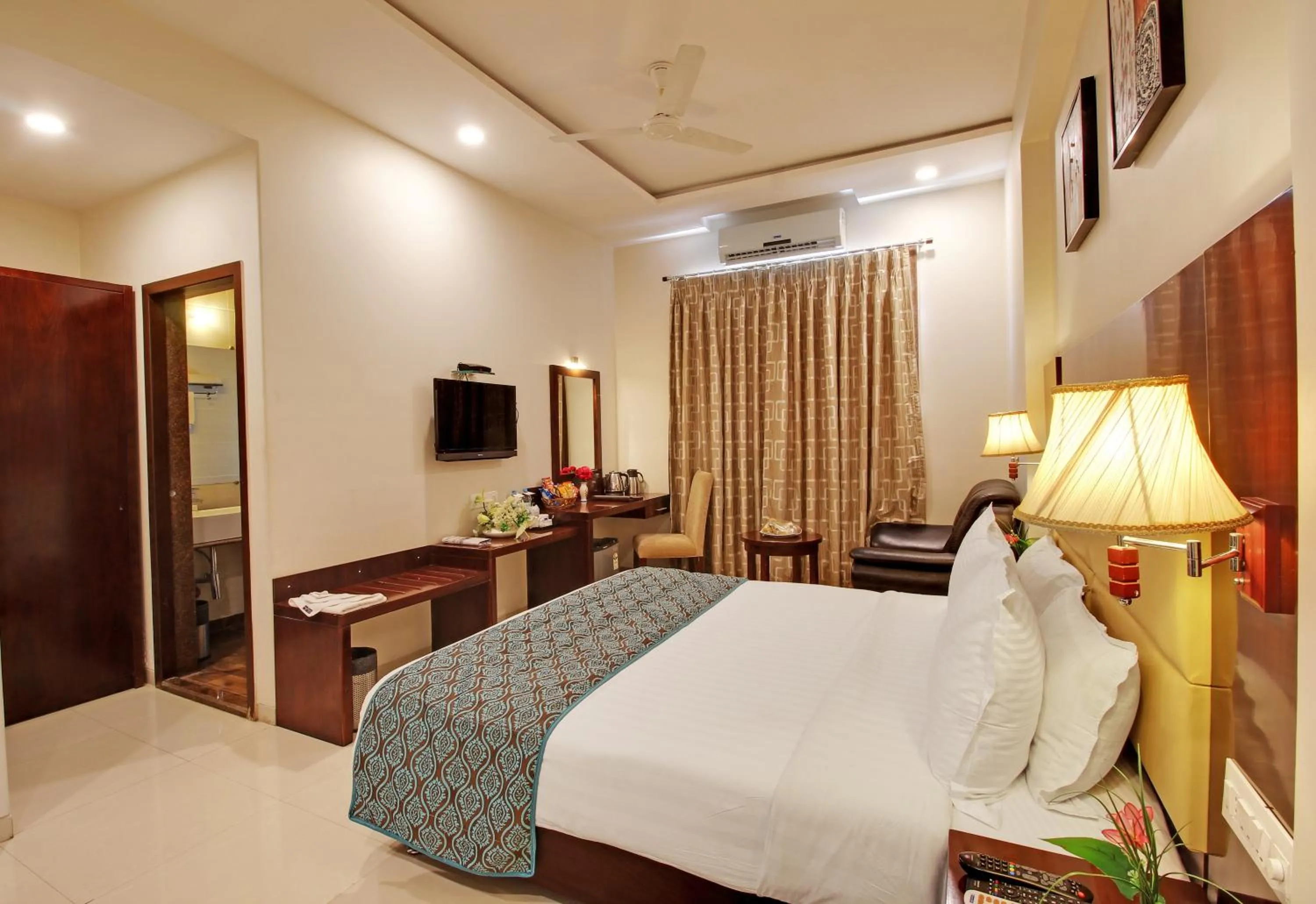 Photo of the whole room, Bed in Hotel Sai Jashan Shirdi - Where blessings & comfort meet