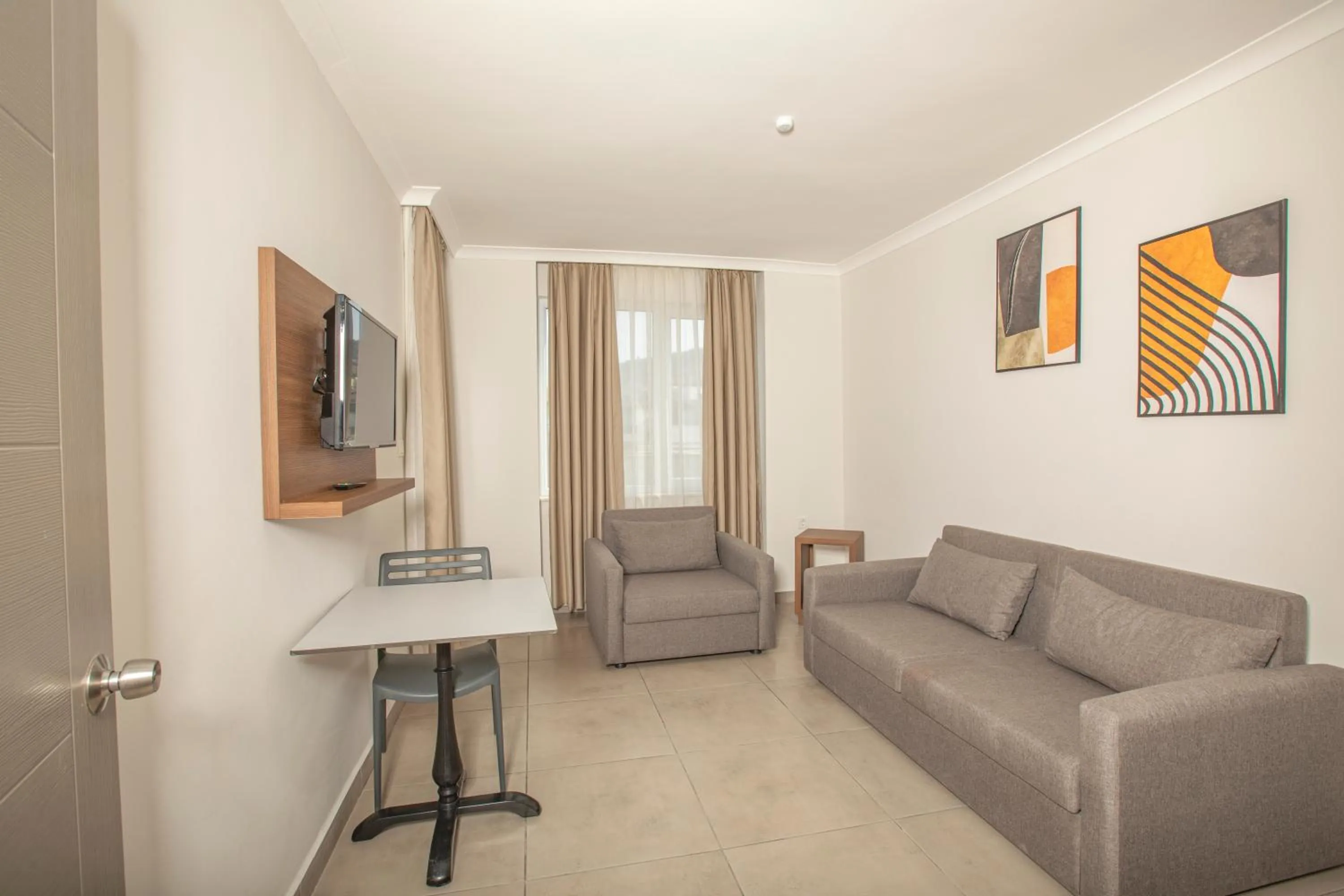 Living room in Perle Apart Hotel