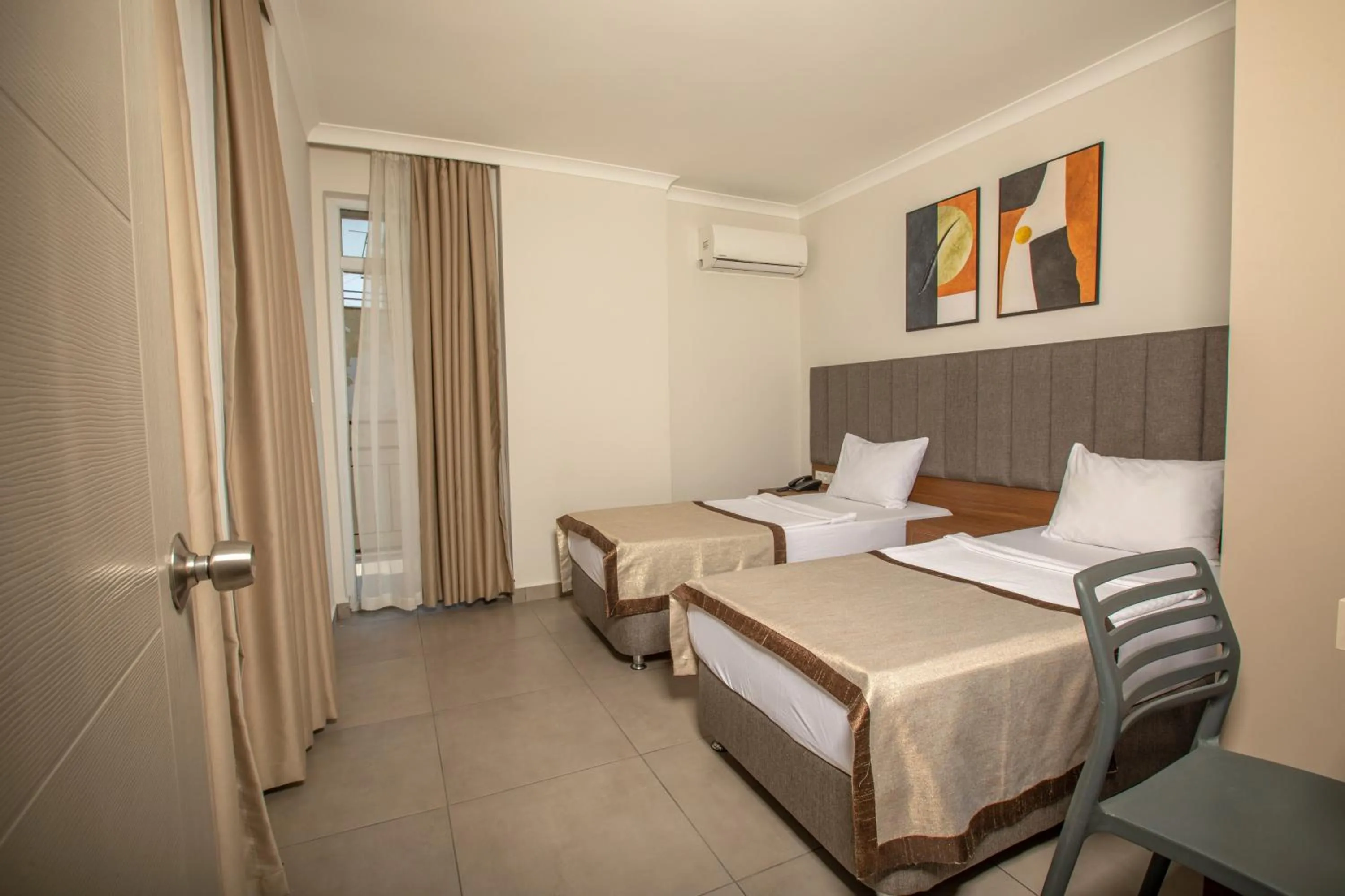 Bedroom in Perle Apart Hotel