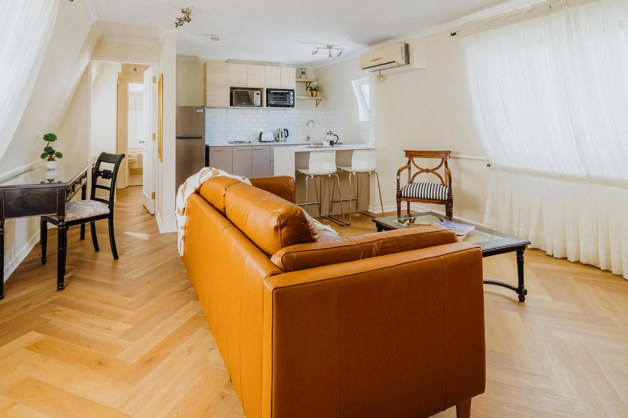 Kitchen or kitchenette in Orly Suites