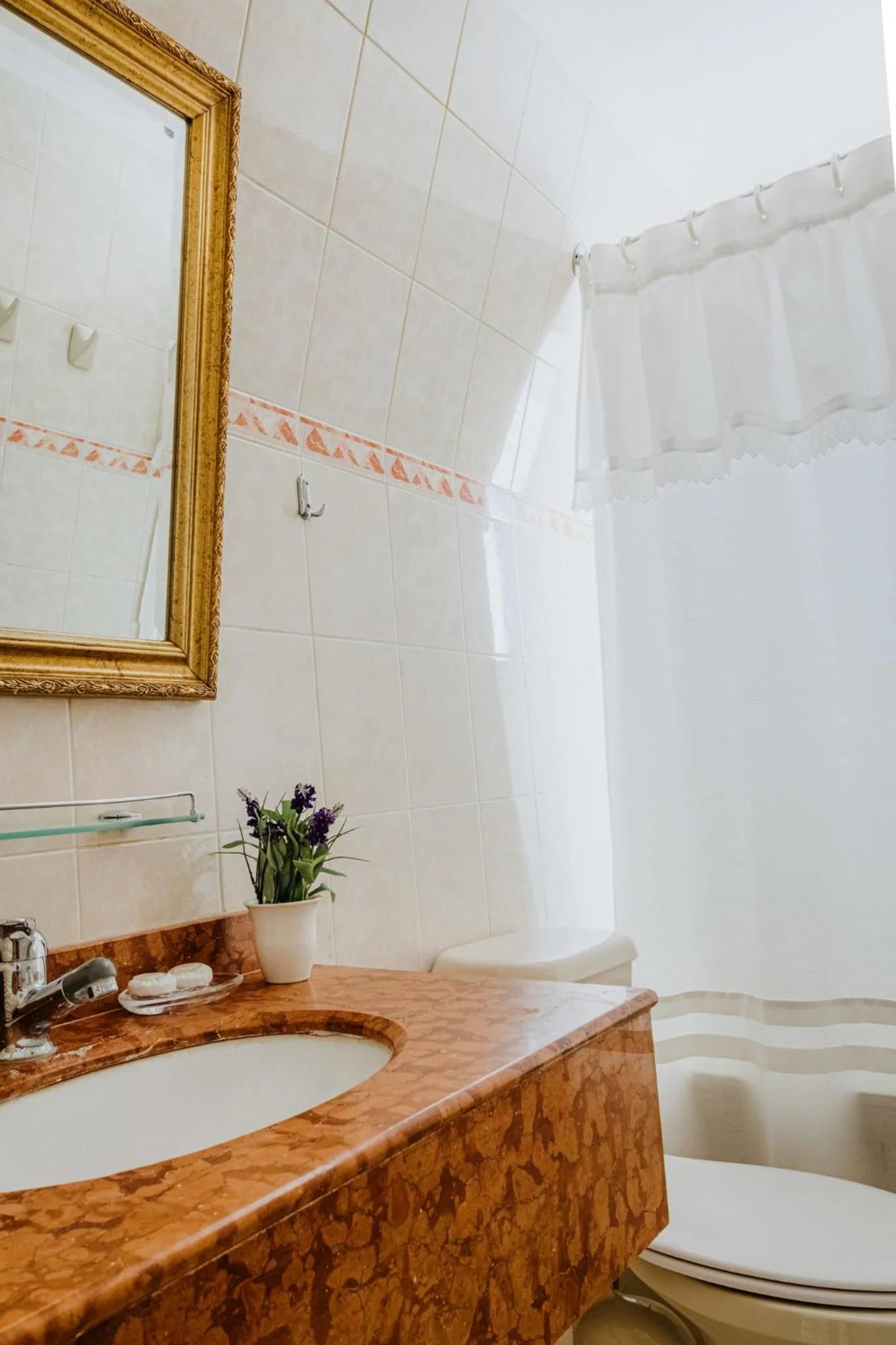 Toilet in Orly Suites