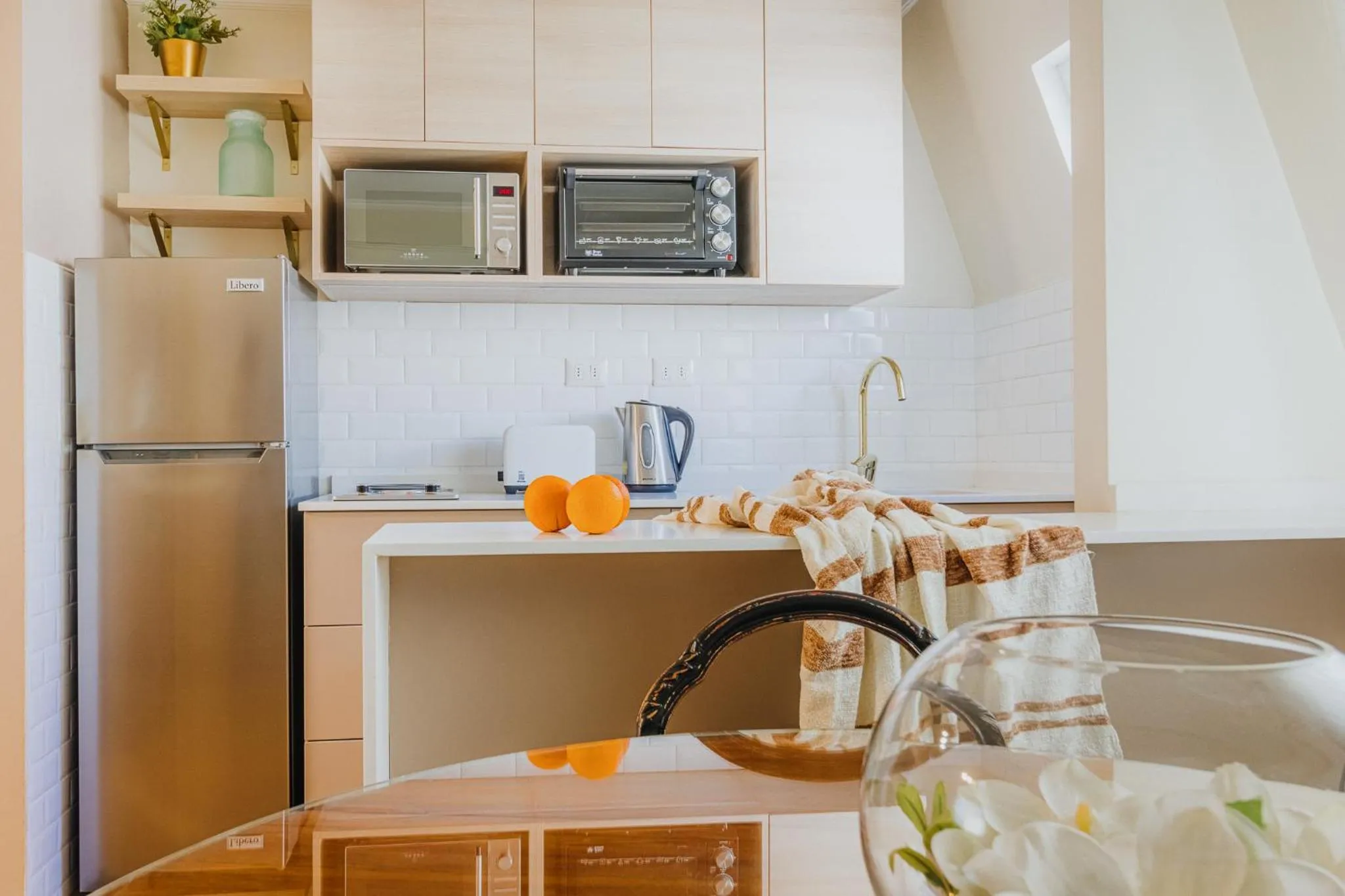 Kitchen or kitchenette in Orly Suites