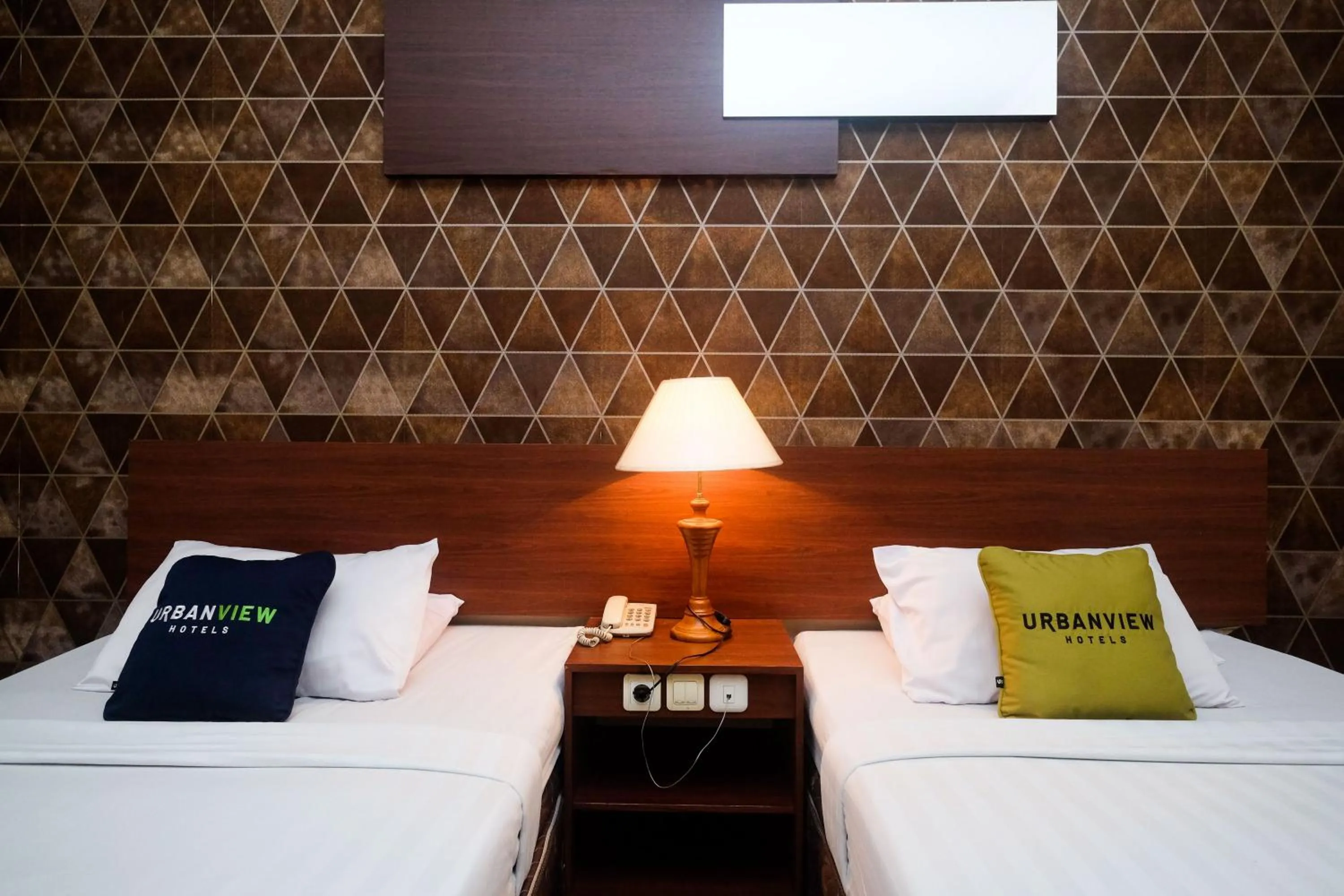 Bed in Urbanview Hotel Anggraeni Jatibarang