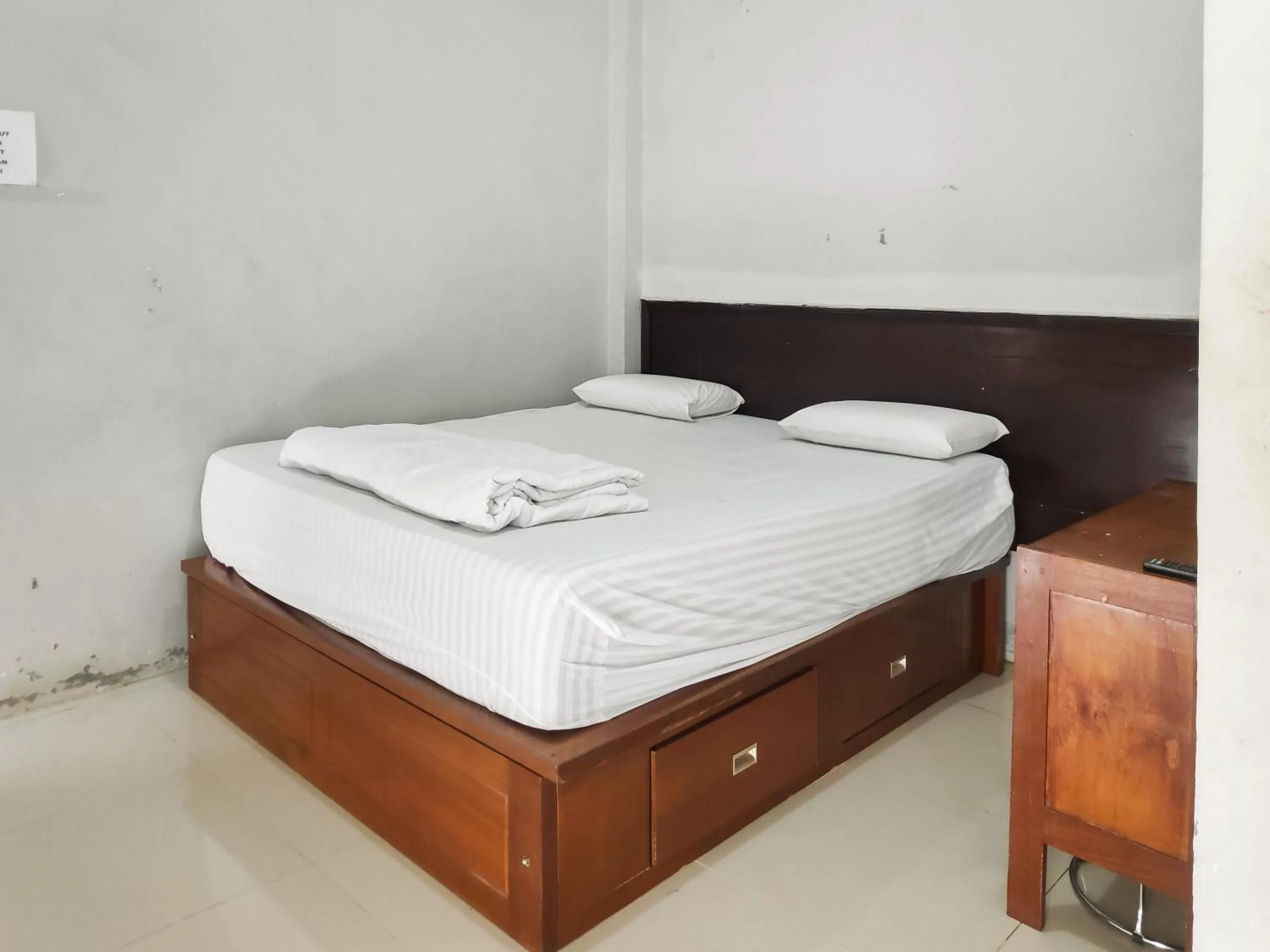 Bed in RedDoorz Syariah near Terminal Terpadu Langsa