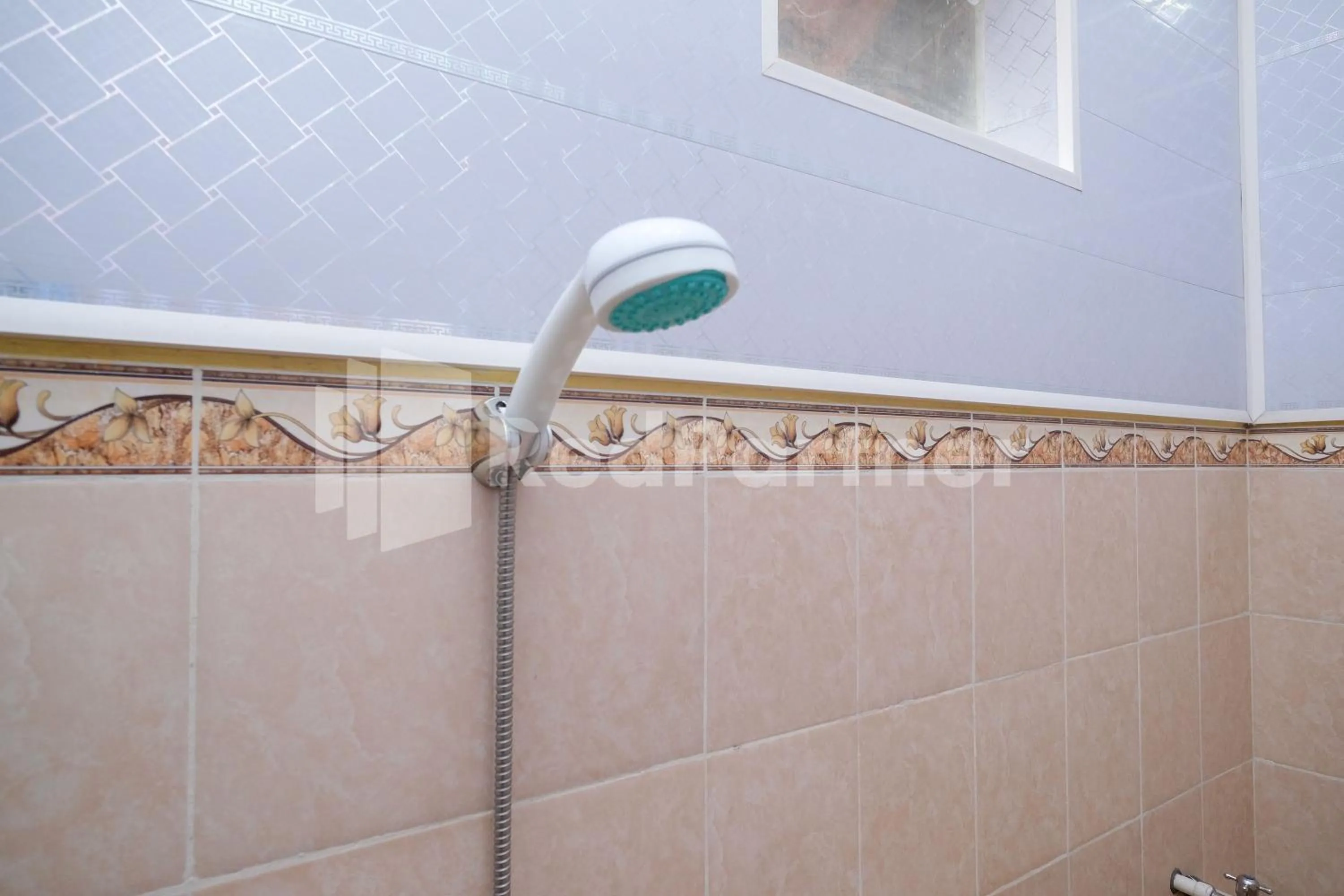 Bathroom in Wisma Giri Mulyo B near Grojogan Sewu Mitra RedDoorz