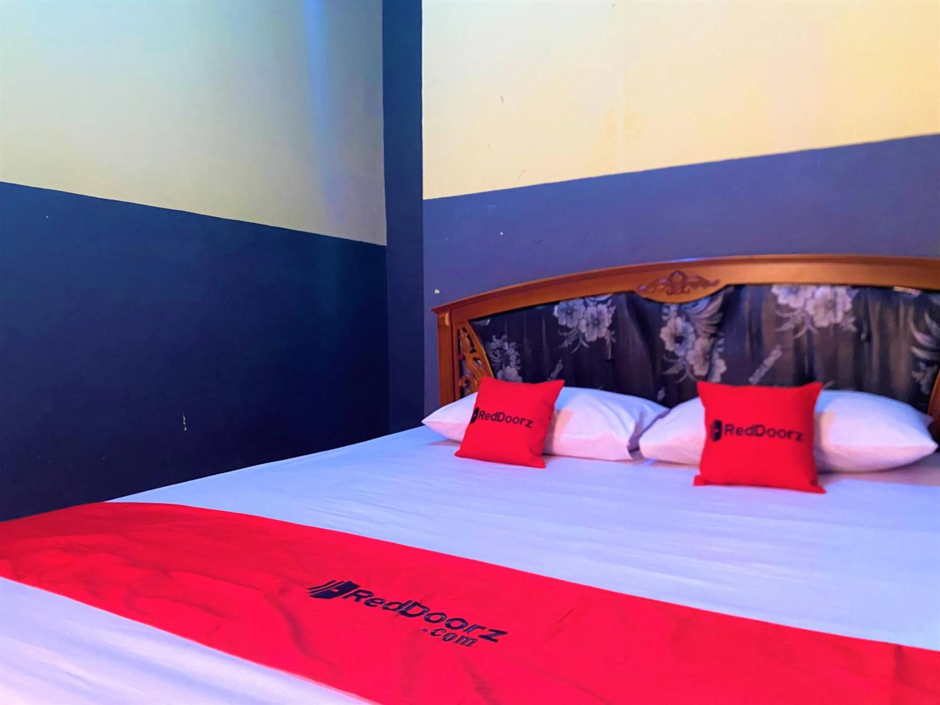 Bed in RedDoorz @ Wisma Sentosa Palopo