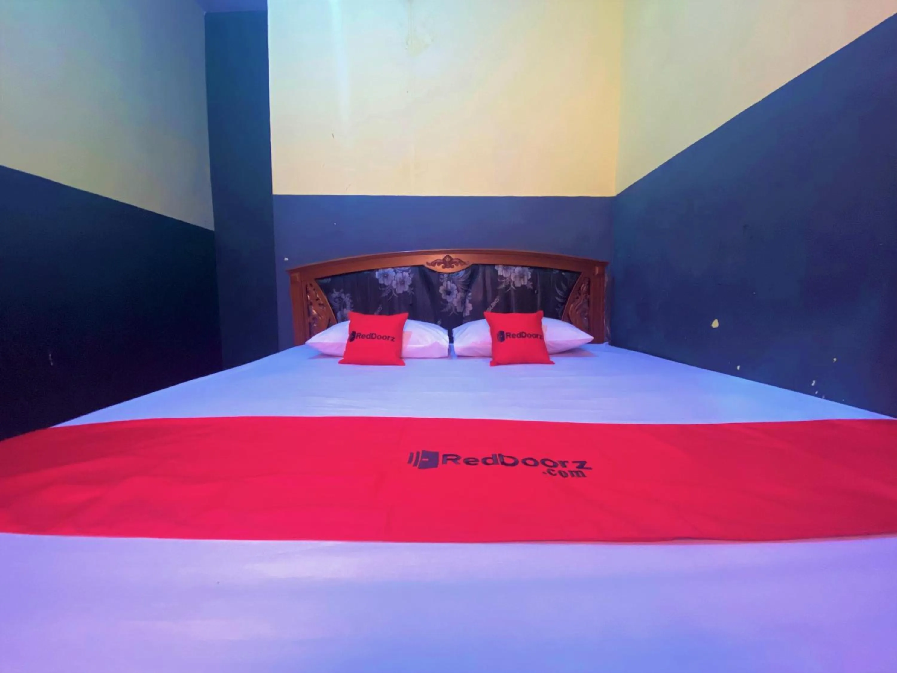 Bed in RedDoorz @ Wisma Sentosa Palopo