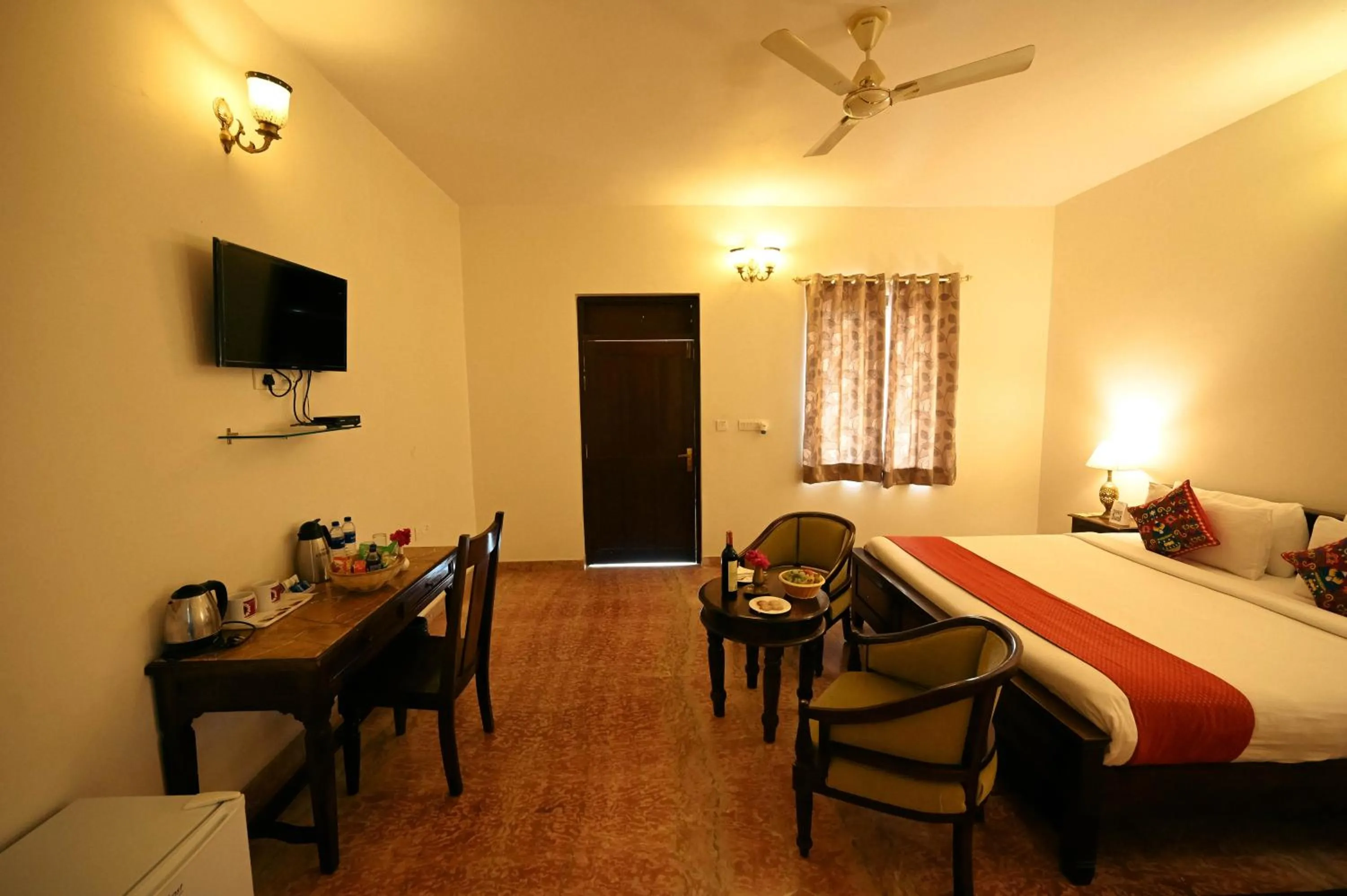 Photo of the whole room, Bed in ClarksInn Suites Ranthambhore