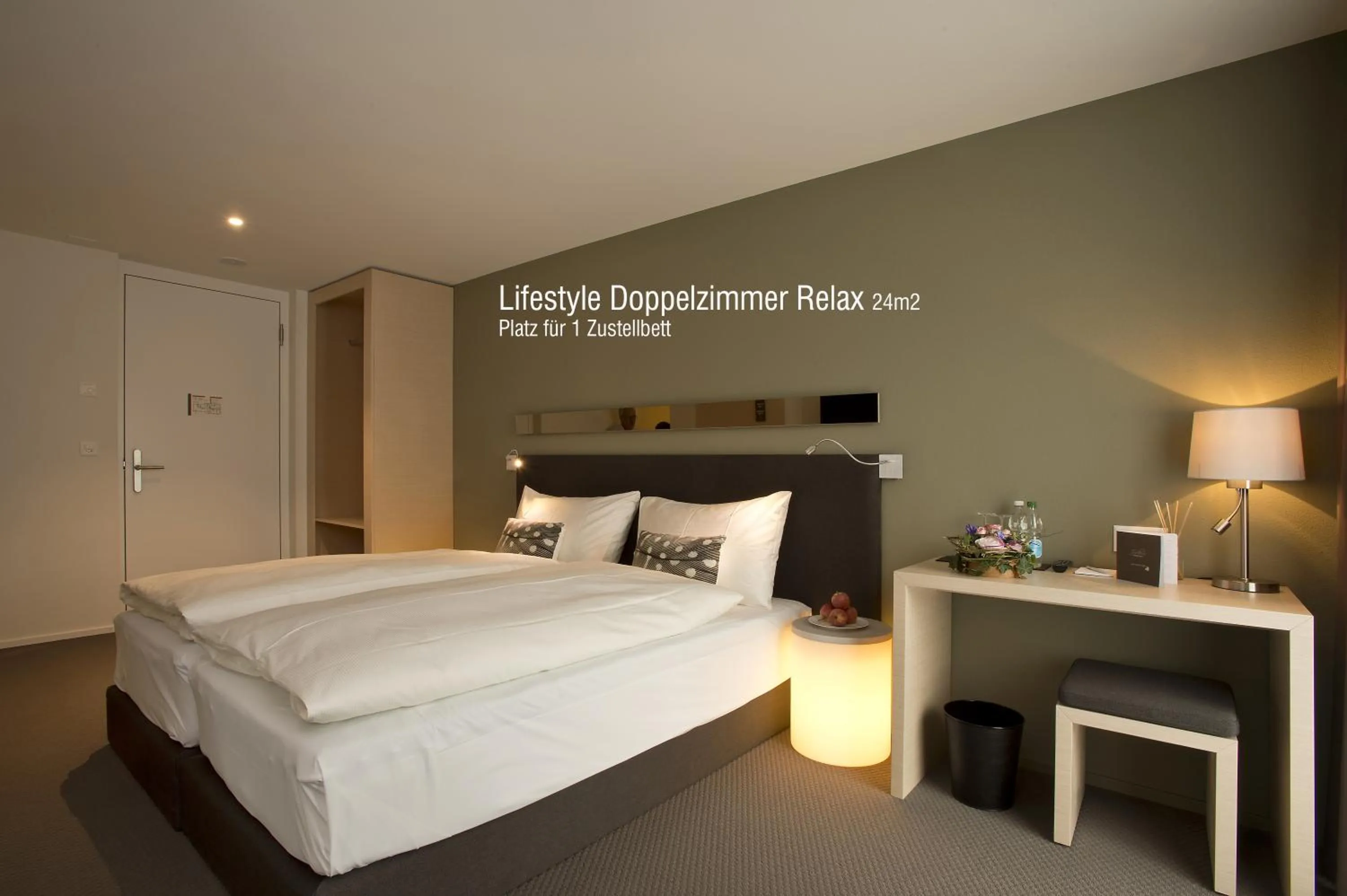 Bed in JUCKERs Boutique-Hotel