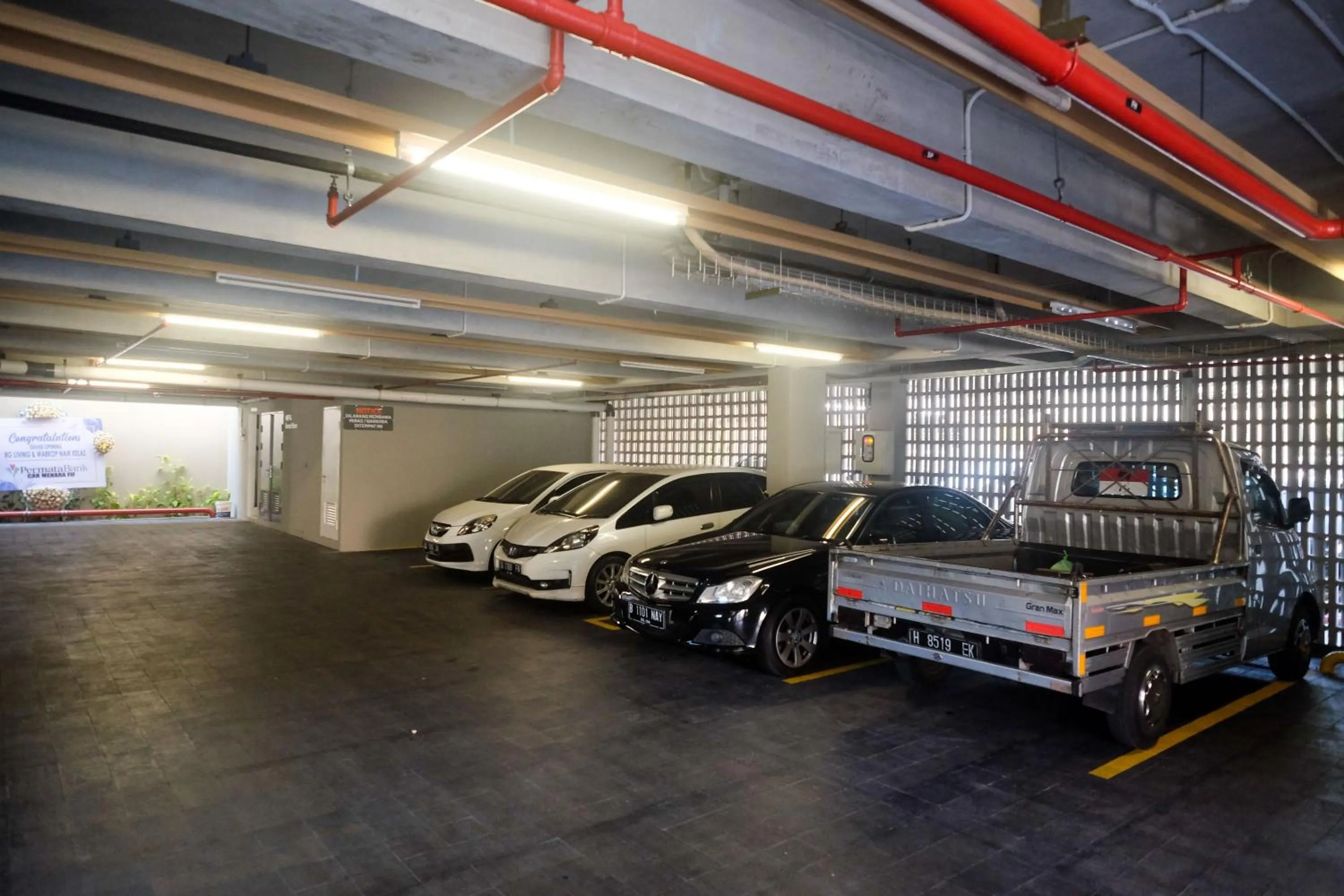 Parking in Sans Hotel RG Living Jogja by RedDoorz