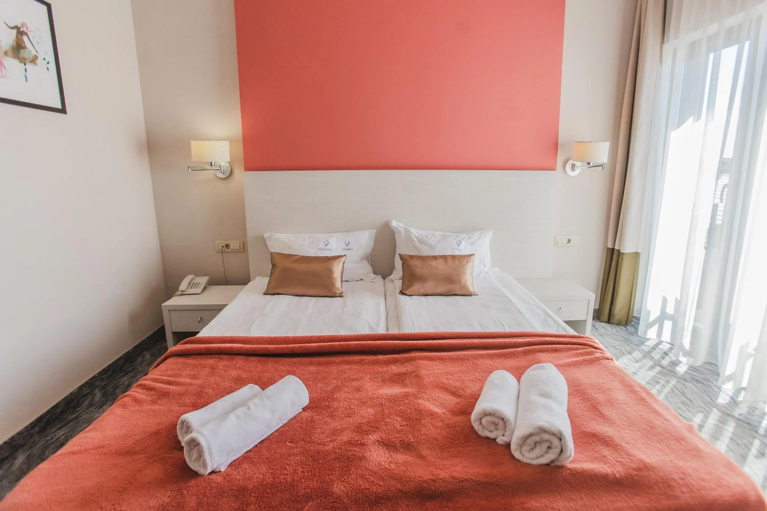 Photo of the whole room, Bed in Caro Boutique Hotel