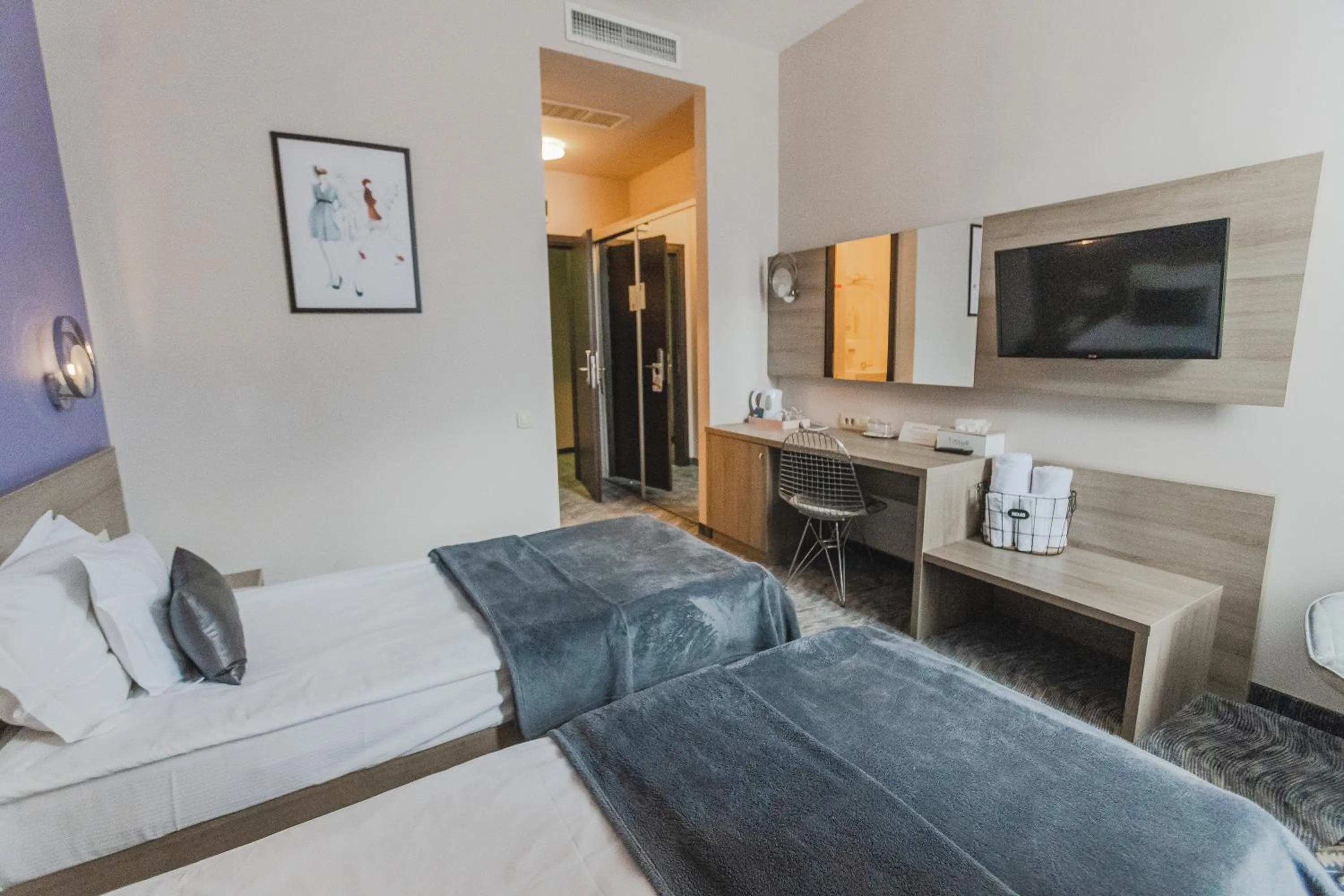 Bed in Caro Boutique Hotel