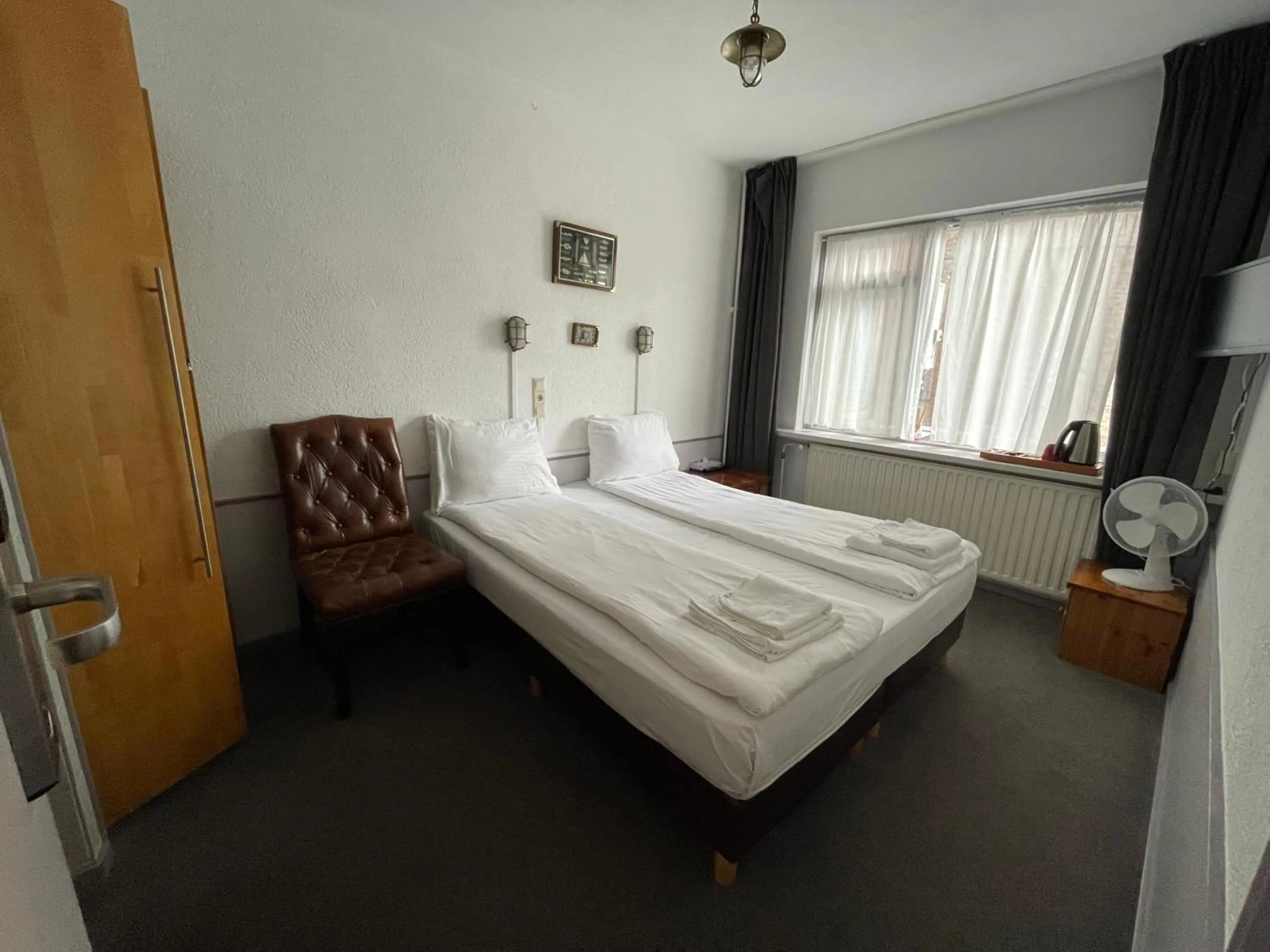 Bed in Amadeus Hotel