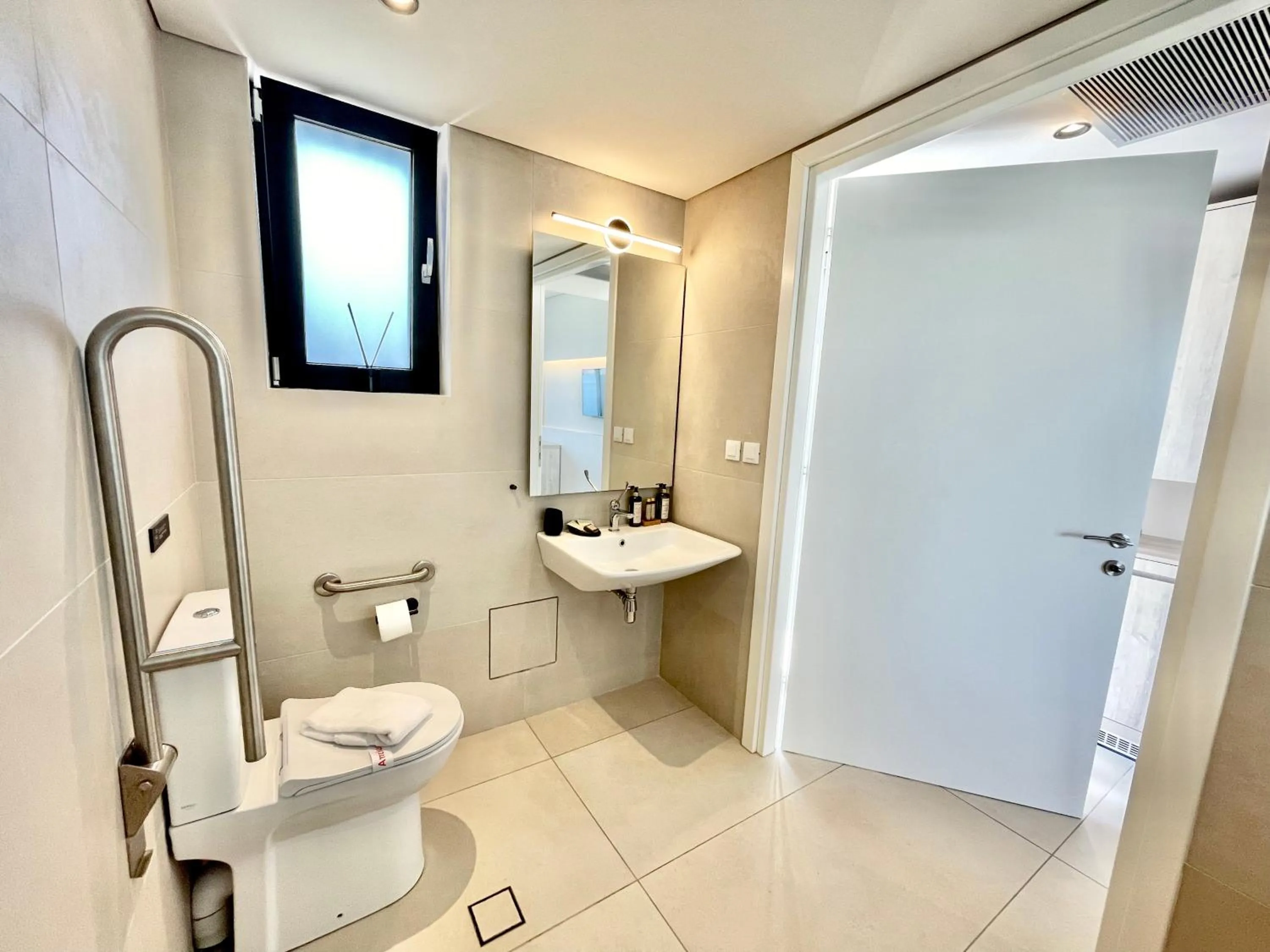 Toilet in Eleia Seafront Rooms & Villas
