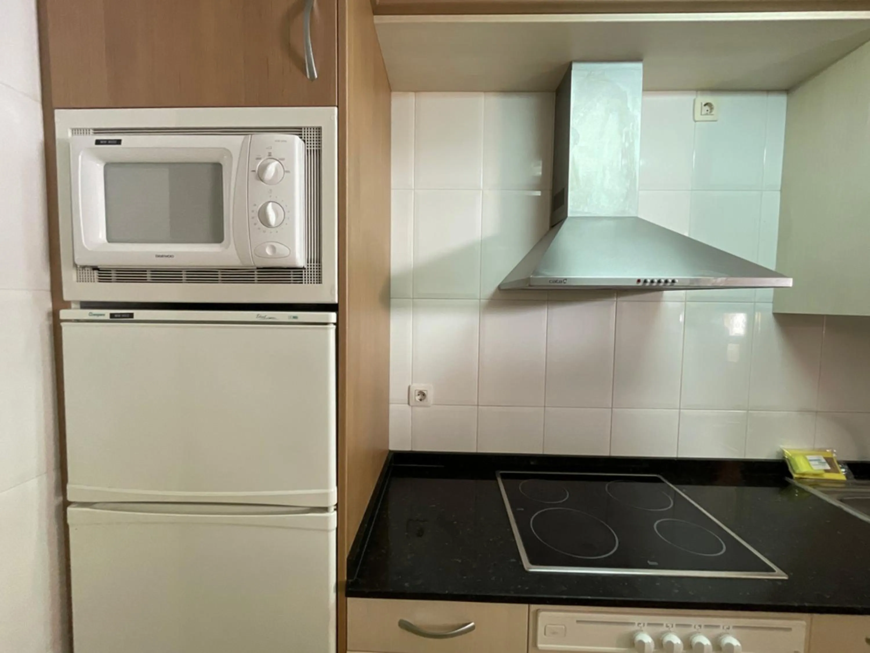 Kitchen or kitchenette in Apartamentos Marcomar 3000