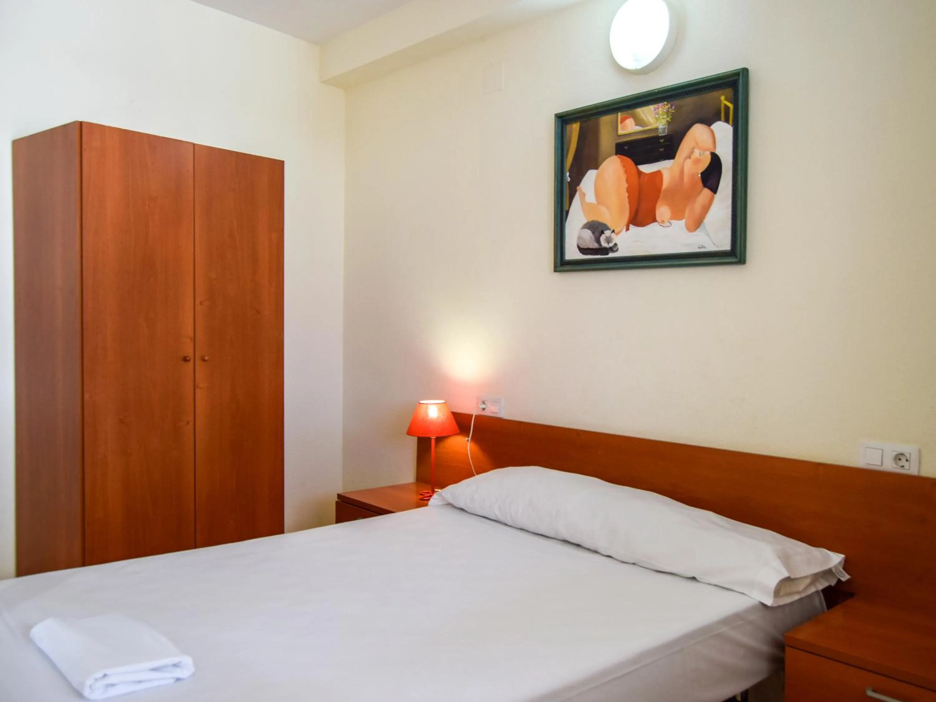 Bed in Apartamentos Marcomar 3000