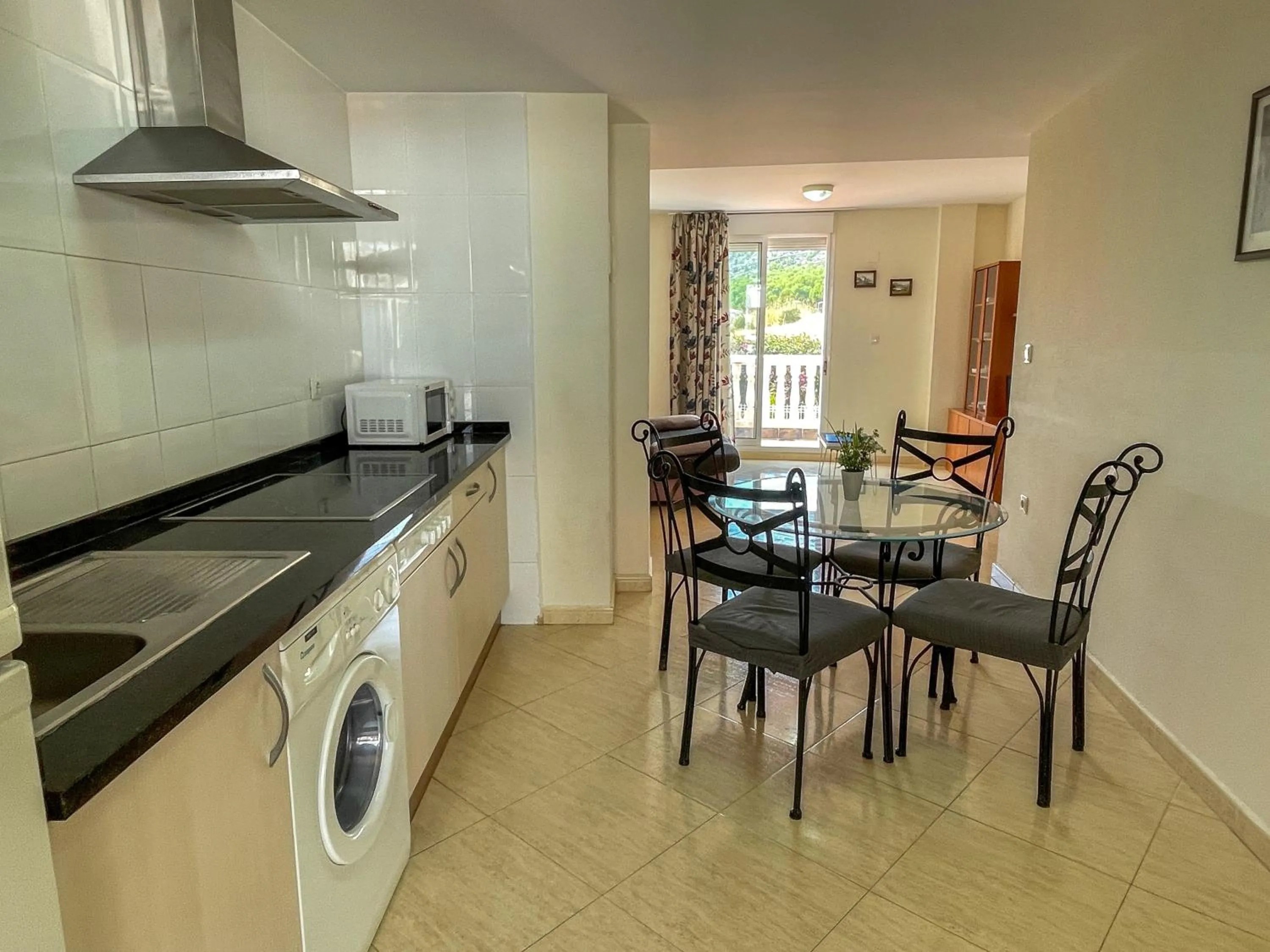 Kitchen or kitchenette in Apartamentos Marcomar 3000