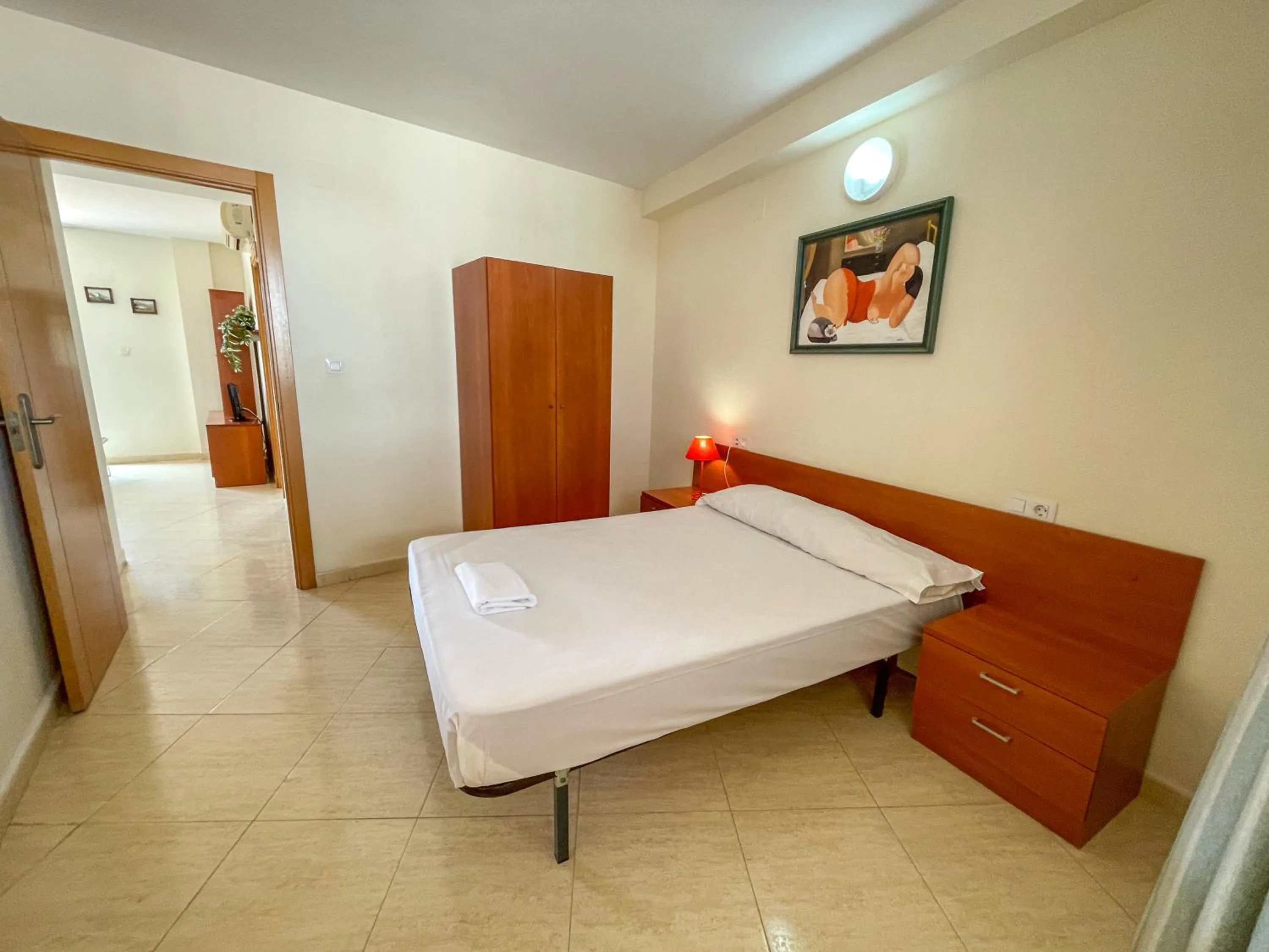 Bed in Apartamentos Marcomar 3000