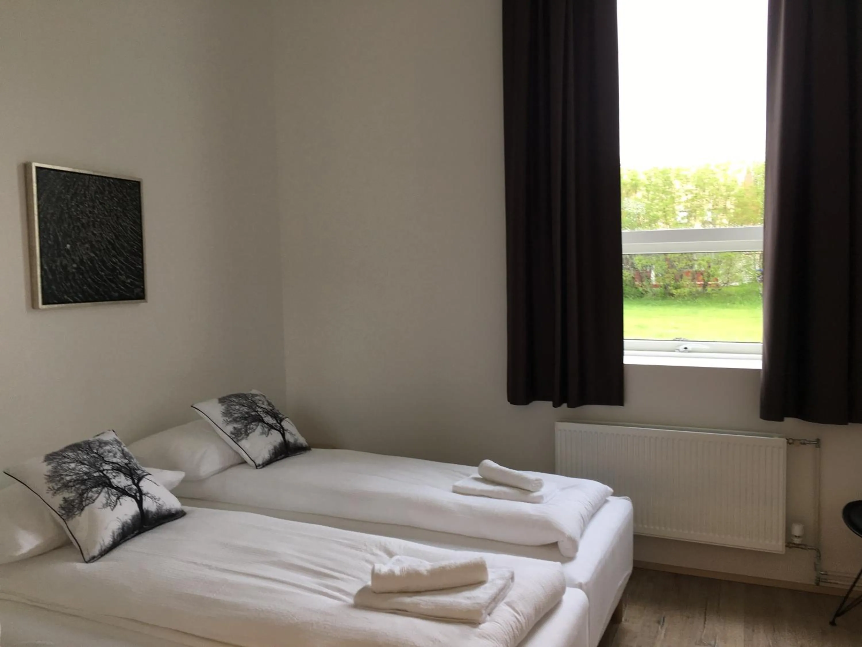 Bed in Welcome Riverside Guesthouse