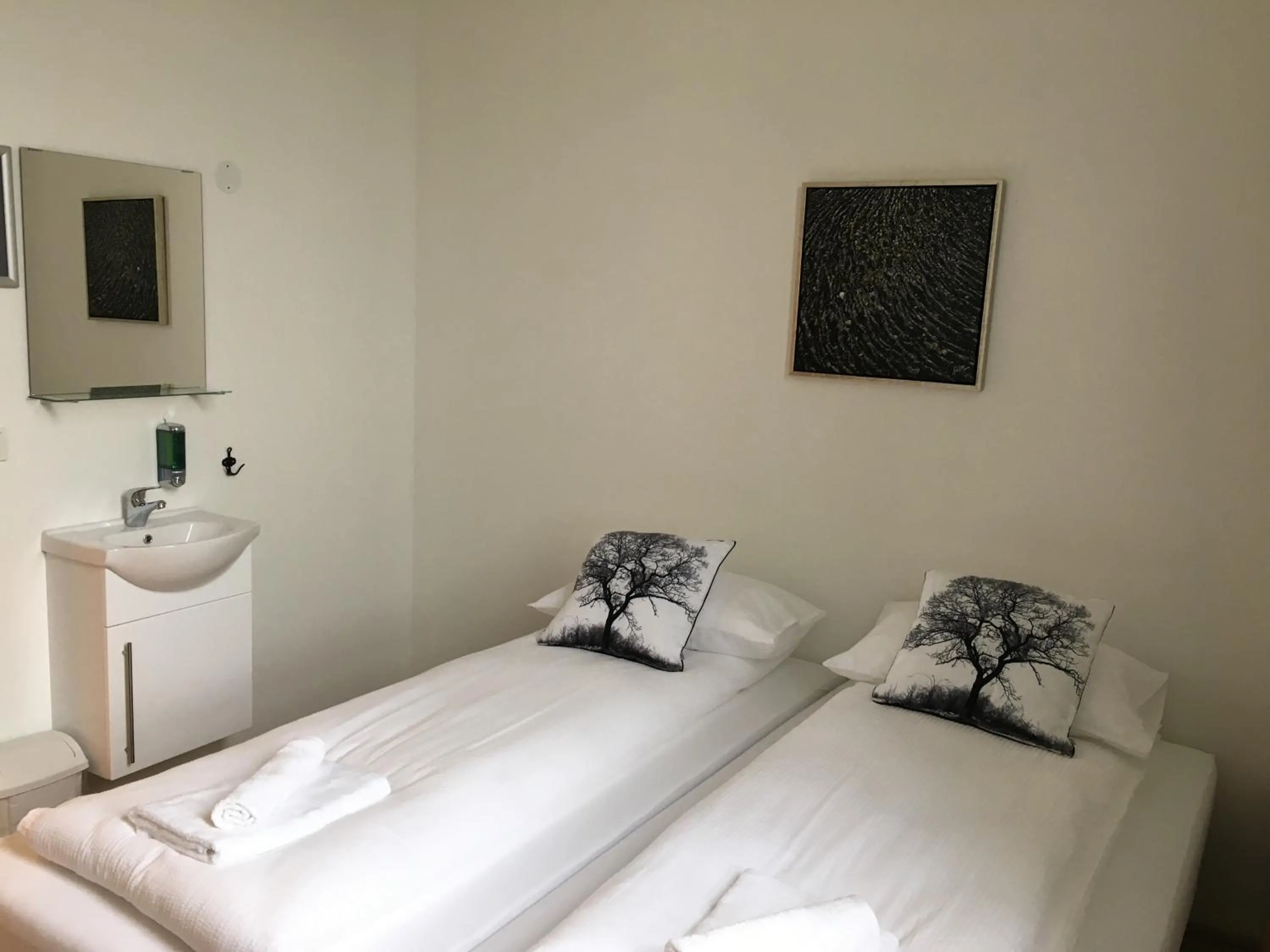 Bed in Welcome Riverside Guesthouse