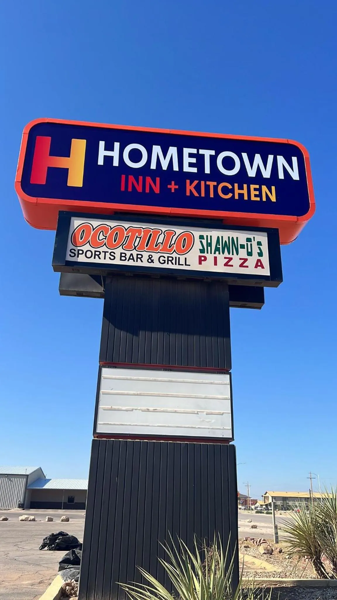 Property Building in Hometown Inn + Kitchen