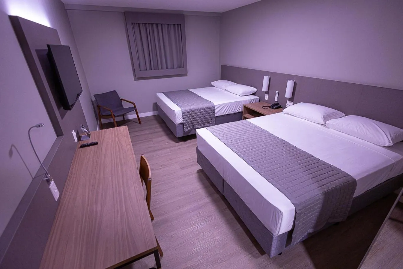 View (from property/room), Bed in Hotel Caiuá Blumenau