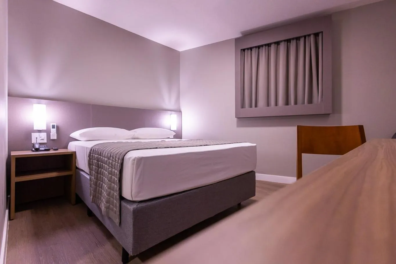 Bed in Hotel Caiuá Blumenau