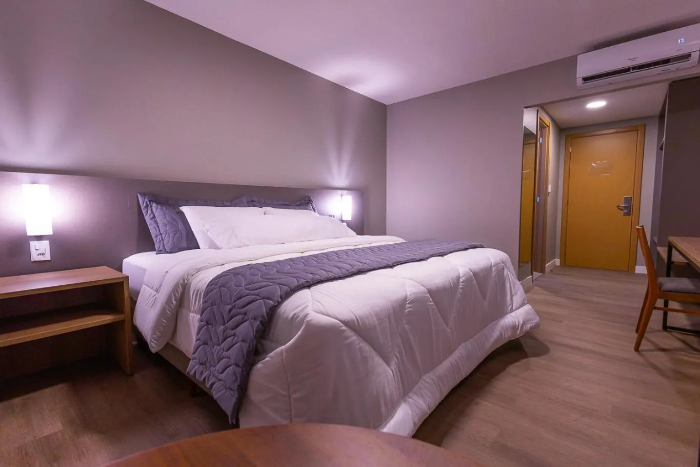 Bed in Hotel Caiuá Blumenau