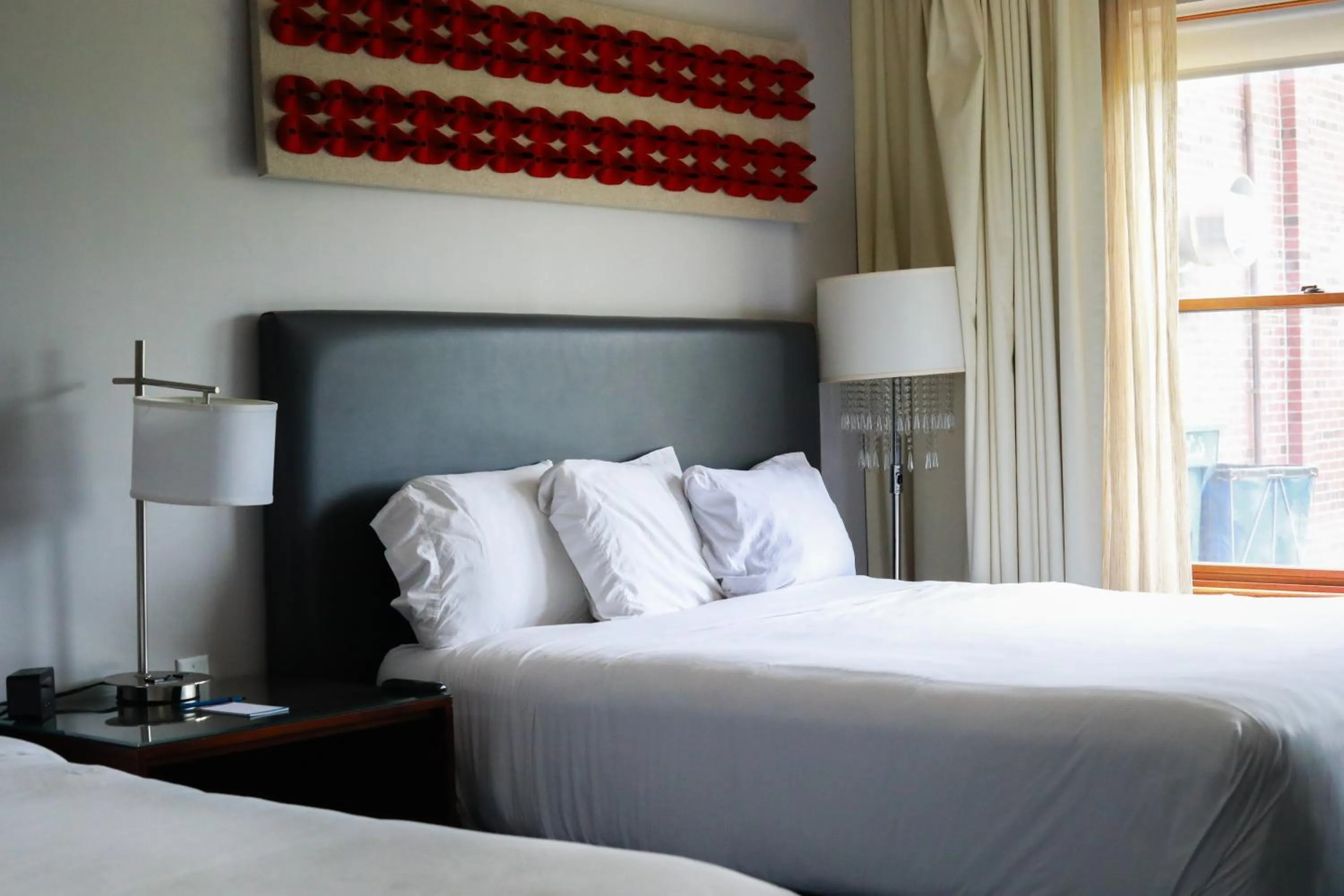 Bed in Illini Inn & Suites