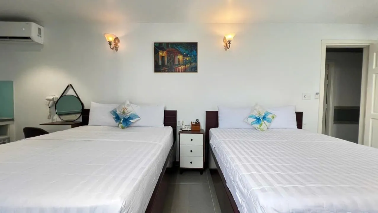 Bed in ĐÔNG NHƯ HOTEL