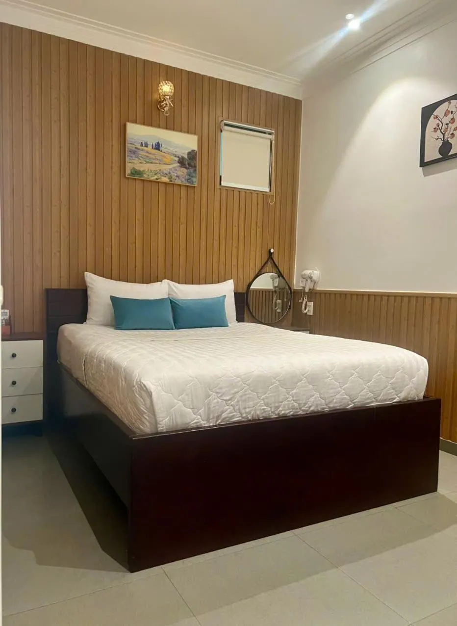 Bed in ĐÔNG NHƯ HOTEL