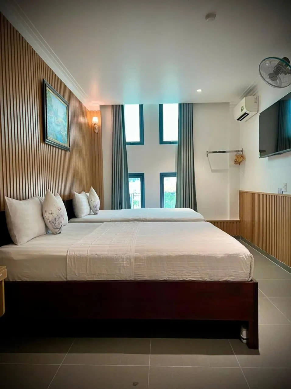 Bed in ĐÔNG NHƯ HOTEL