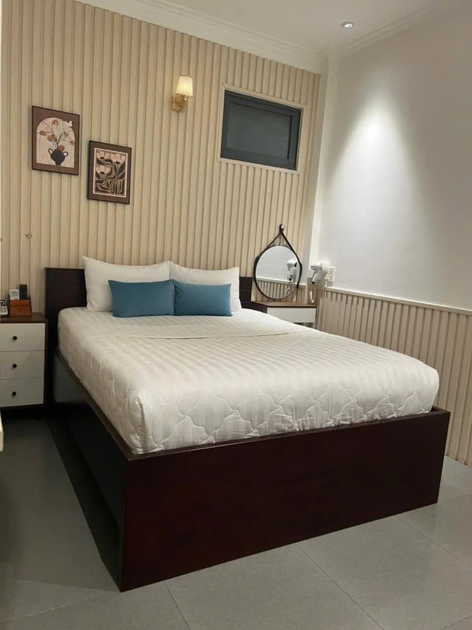 Bed in ĐÔNG NHƯ HOTEL