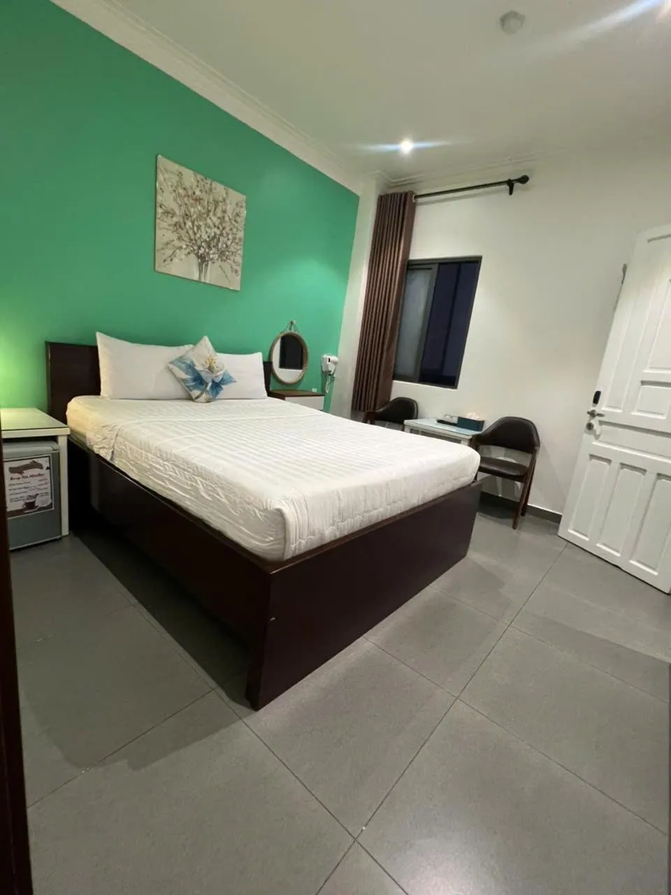 Bed in ĐÔNG NHƯ HOTEL