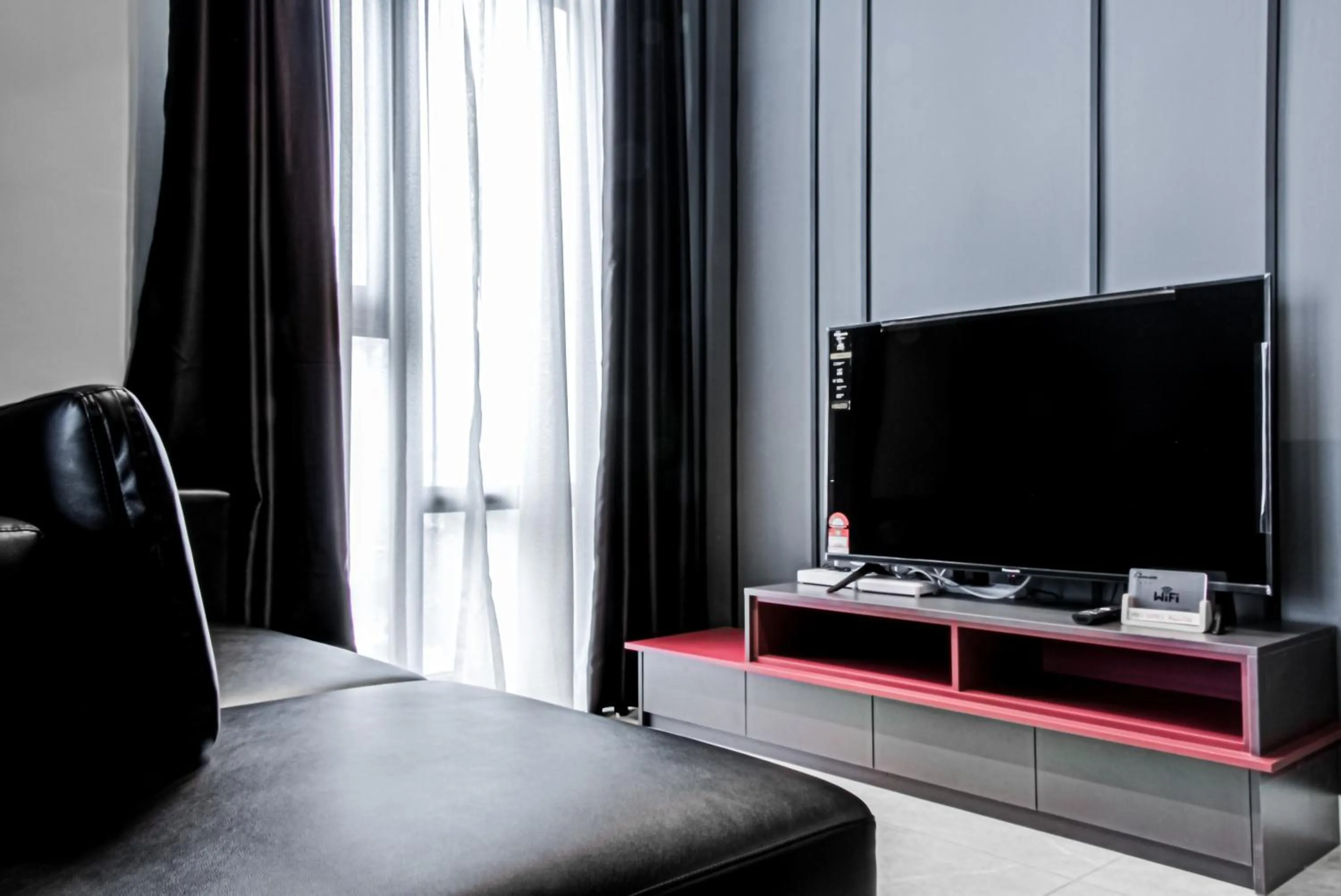 TV and multimedia in Axon Residence at Pavilion KLCC KL Tower view by KIMIRO