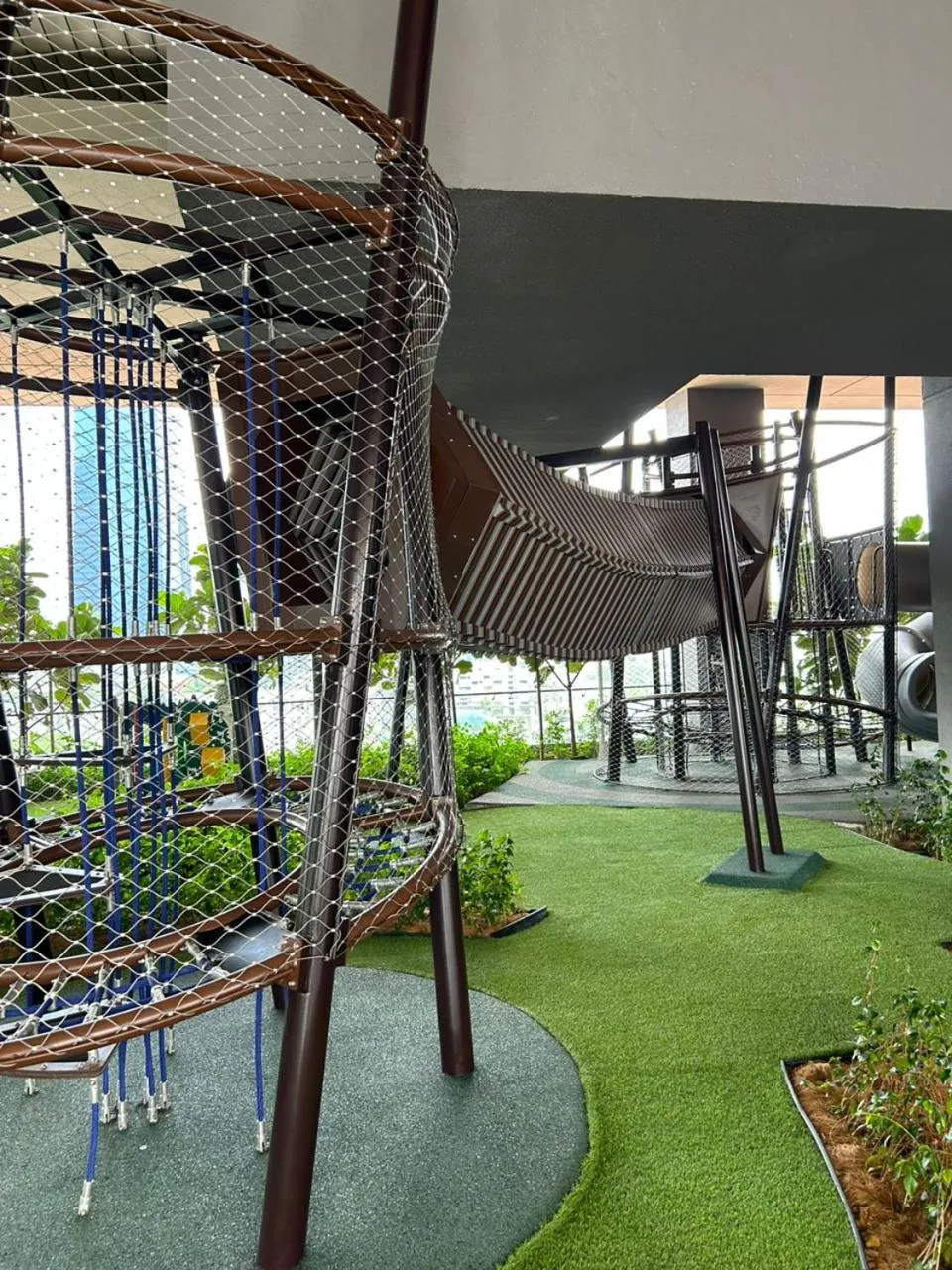 Children play ground in Axon Residence at Pavilion KLCC KL Tower view by KIMIRO