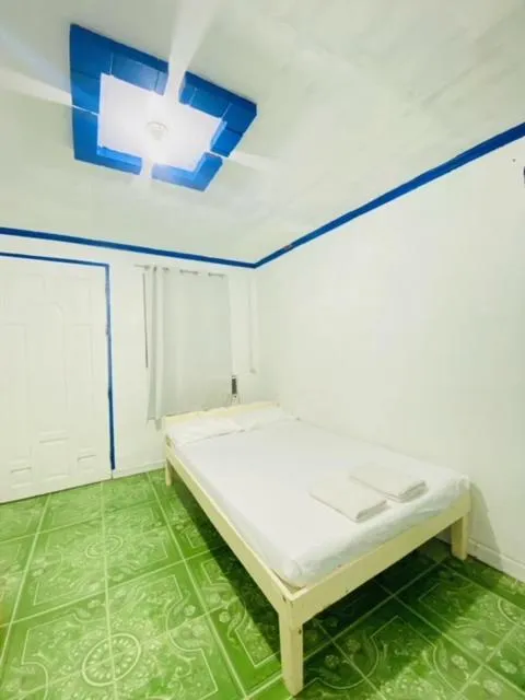 Bed in AOZORA RESORT