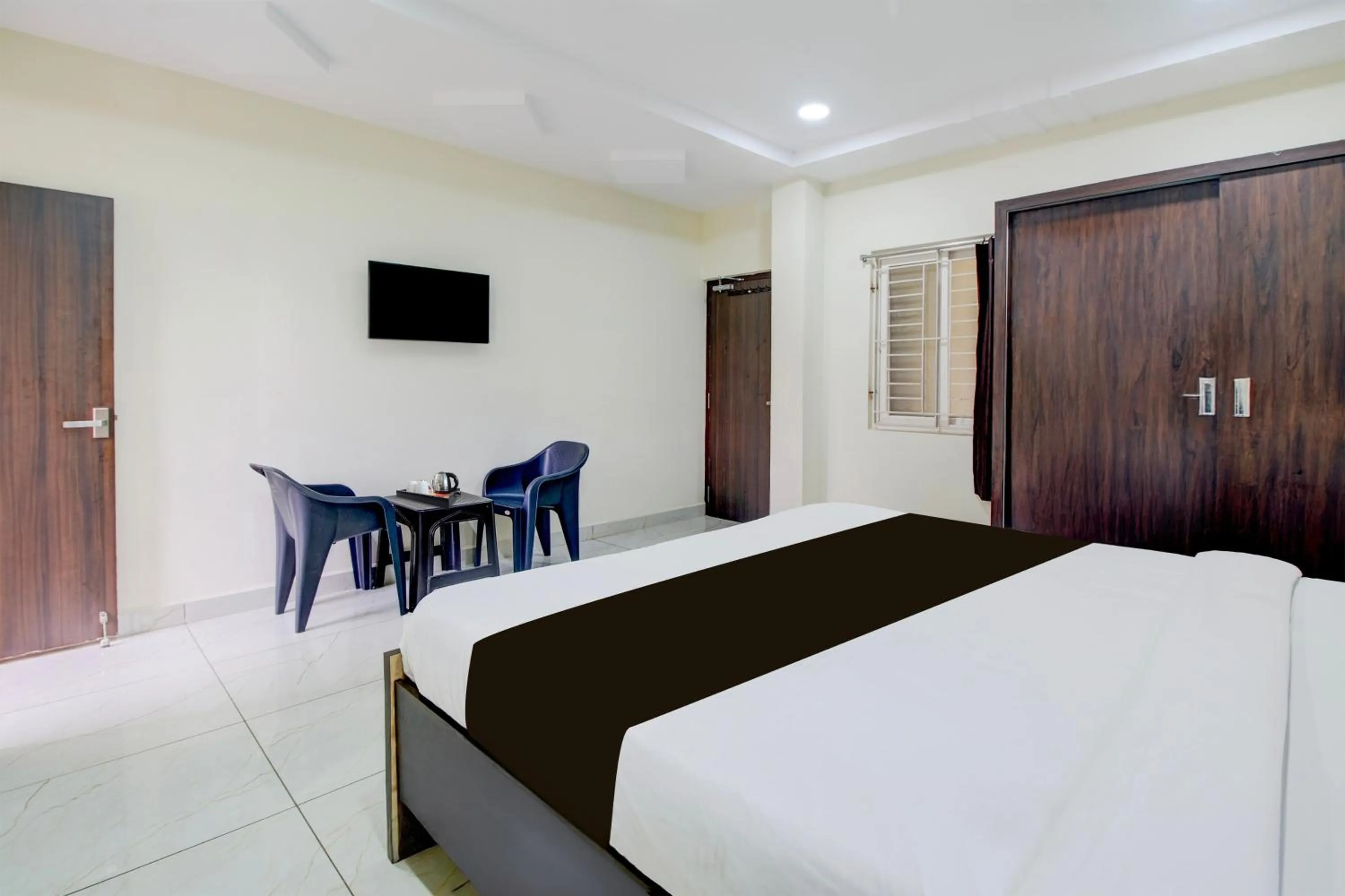 Bedroom, Bed in Super Hotel O Ramavarapadu Near PVR Icon