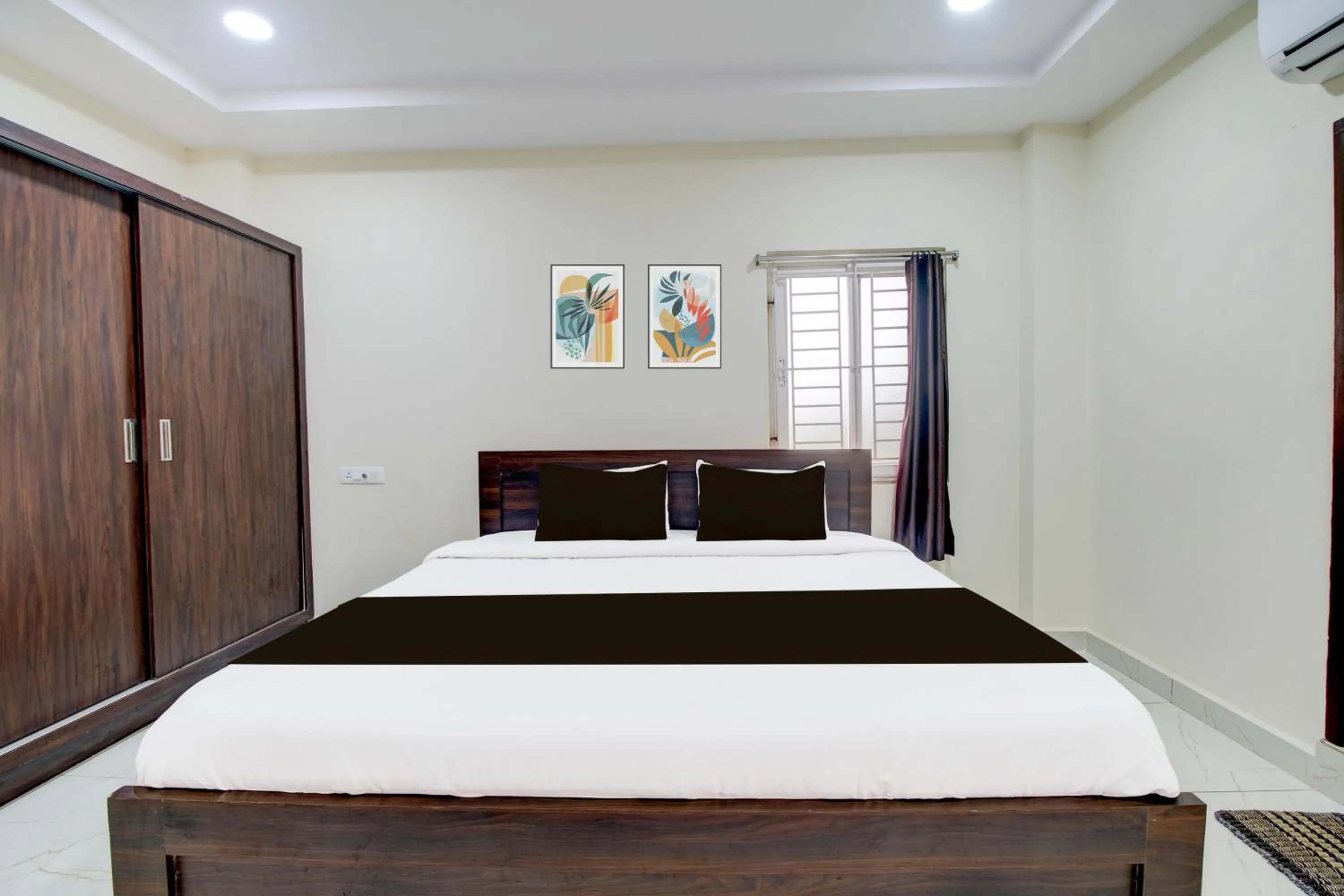 Bedroom, Bed in Super Hotel O Ramavarapadu Near PVR Icon
