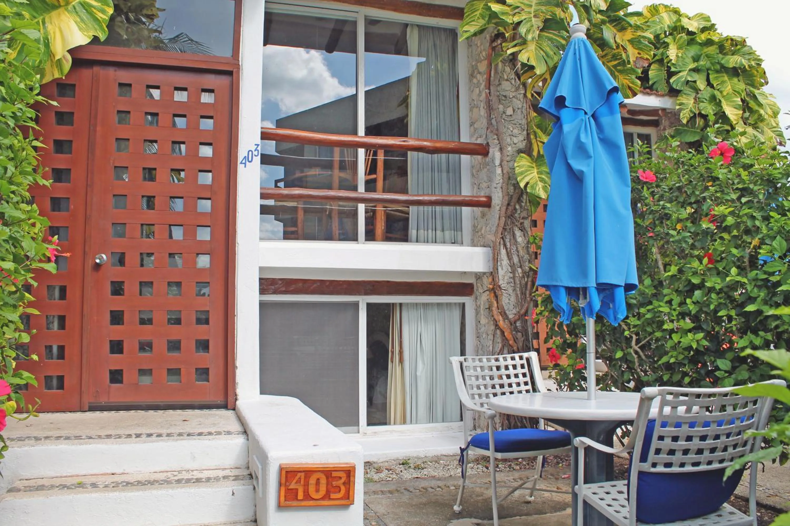 Patio in Casa del Mar Cozumel Hotel & Dive Resort with free access to an exclusive beach club